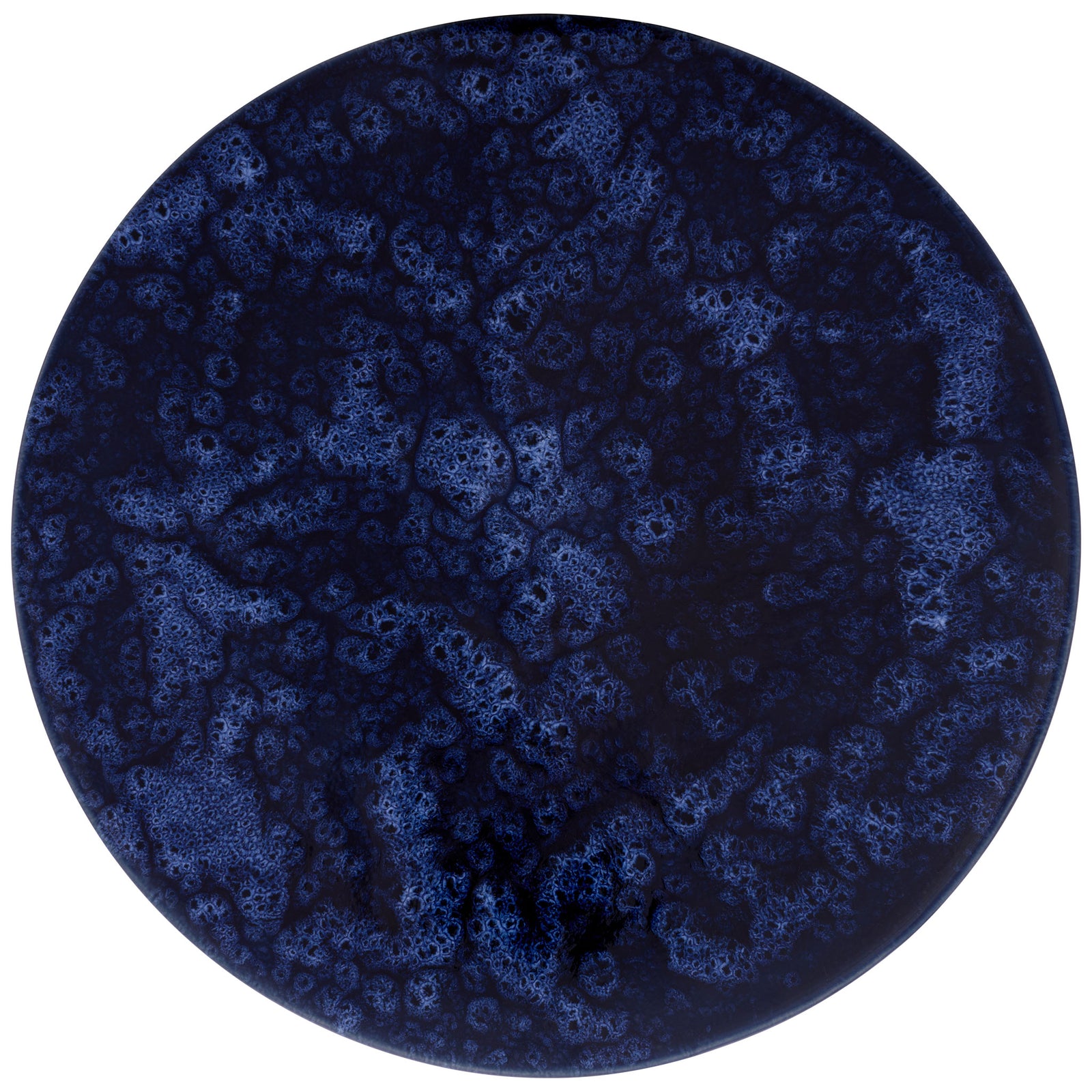 A circular ceramic top displays swirling, speckled variations in its dark blue glaze || ACS4615A || top_studio