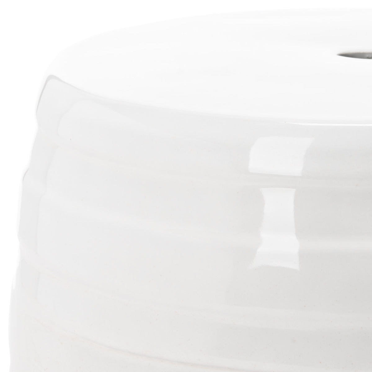 Raised bands and a glossy white glaze bring sculptural texture to this ceramic garden stool. || ACS5201C || detail_studio