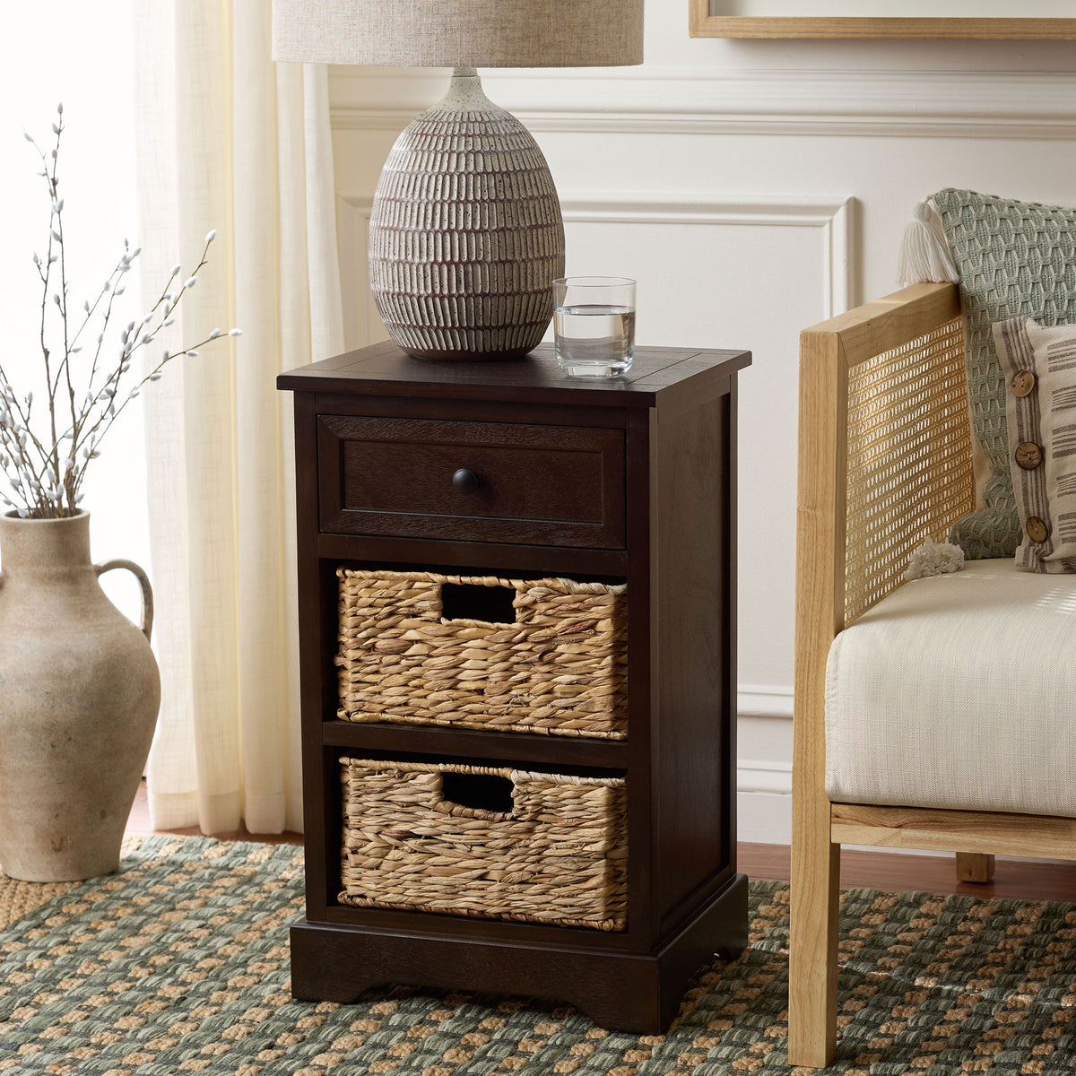 A dark brown side table blends convenient basket storage with a warm, timeless finish. || AMH5700H || front_angle_room