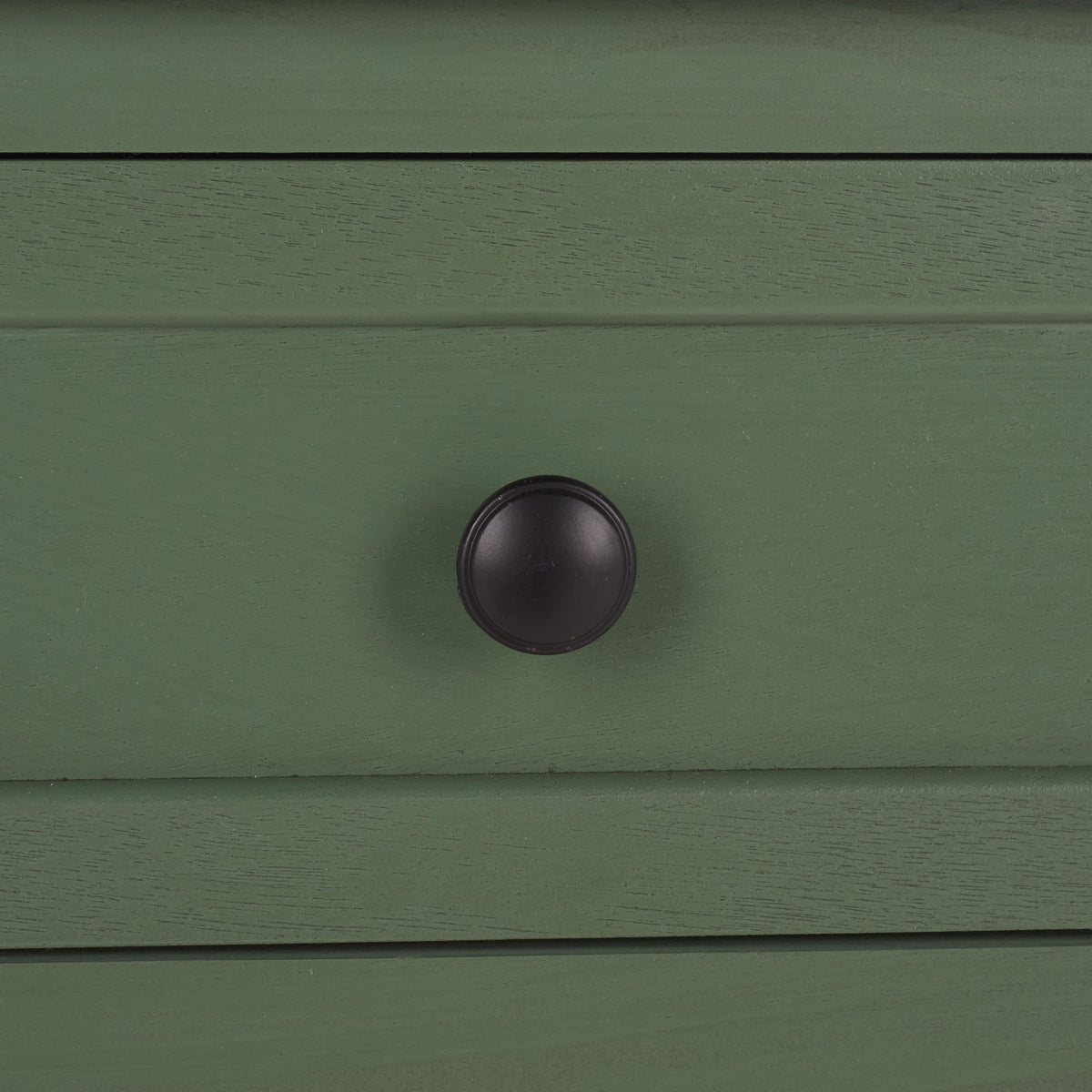 A dark round knob contrasts with the dusty green drawer and its subtle wood grain. || AMH5700L || handle_studio