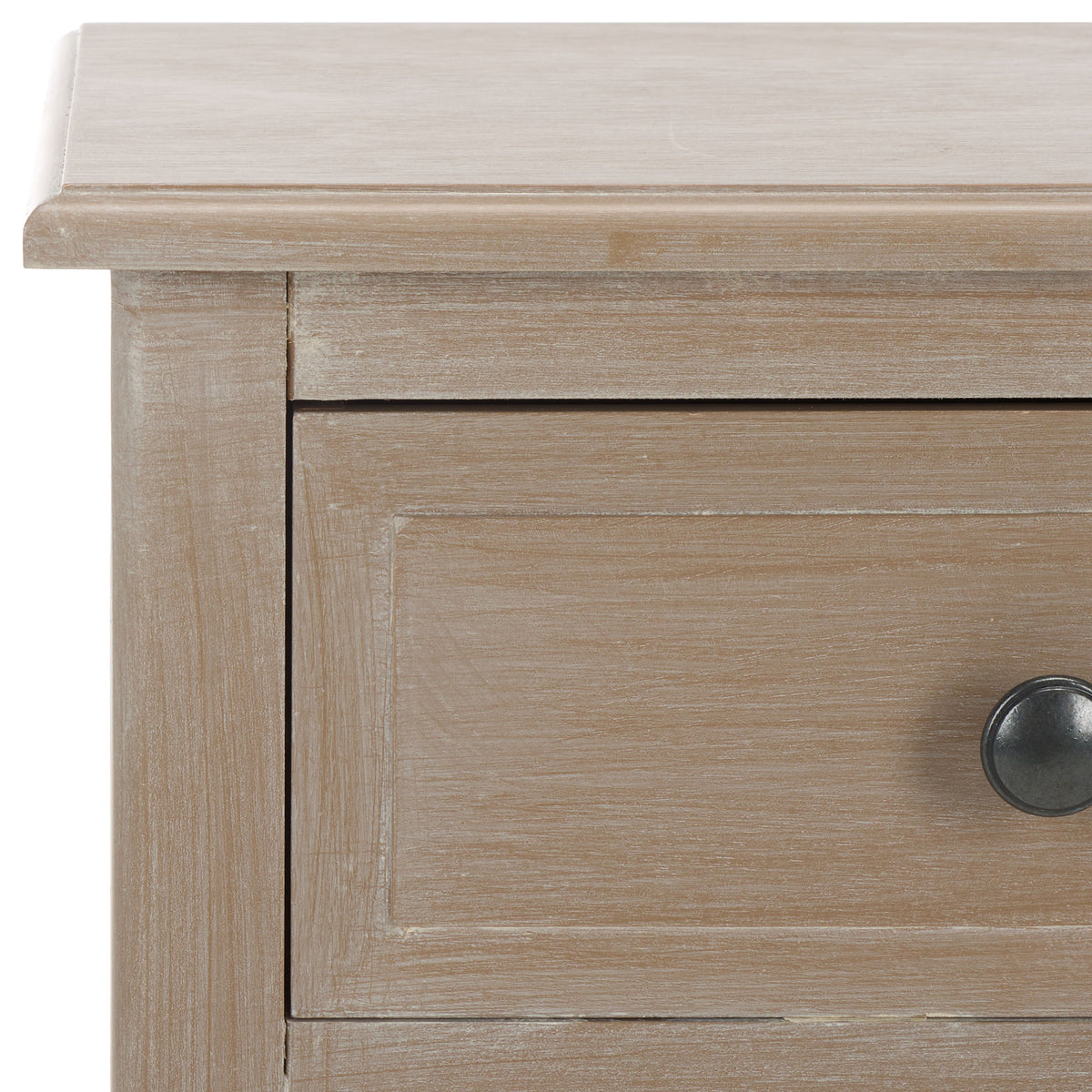 Recessed drawer framing meets a softly whitewashed top for a refined, rustic finish.