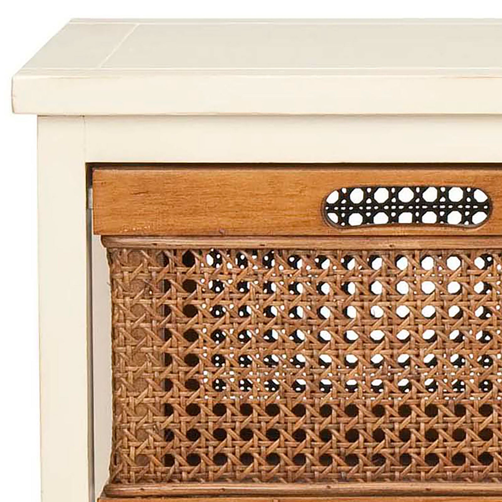 Cream-painted wood and amber cane weave surround an oval cutout handle on the upper drawer. || AMH6504A || detail_studio