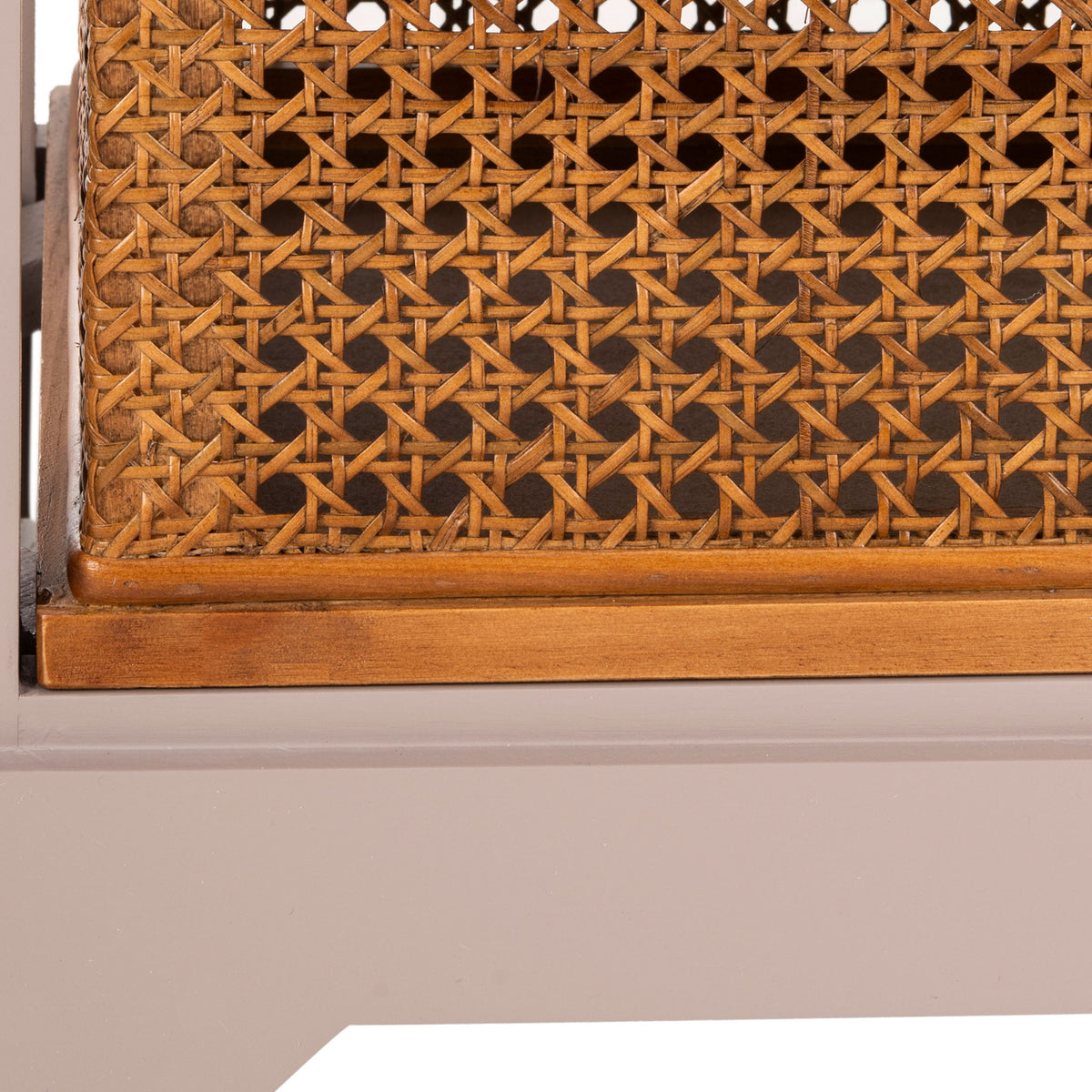 A sculpted gray base supports the warm wood trim and intricate cane weave of the lower drawer. || AMH6504C || leg_studio