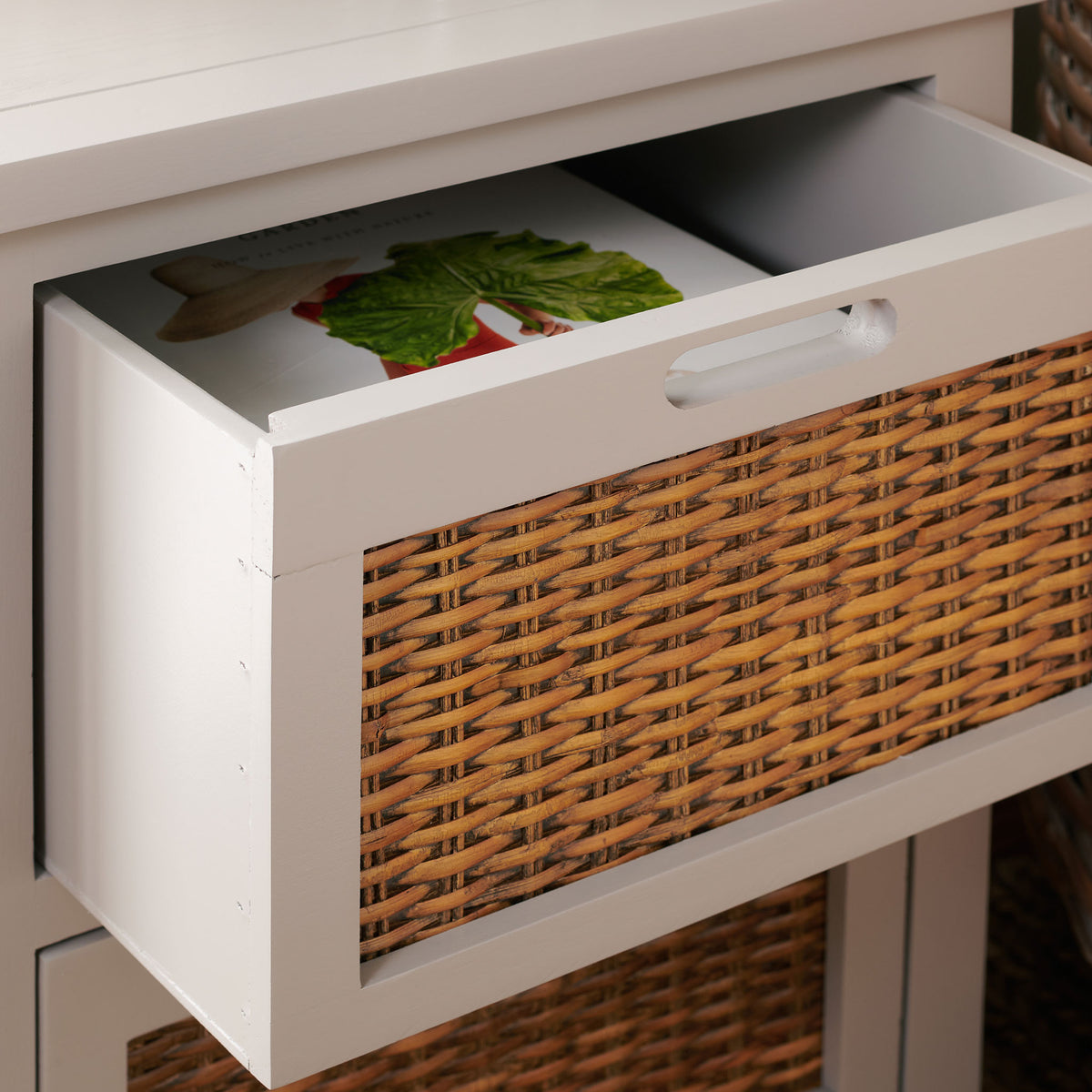 A woven-front drawer opens to reveal storage within the soft gray wood frame || AMH6531C || storage_open_room