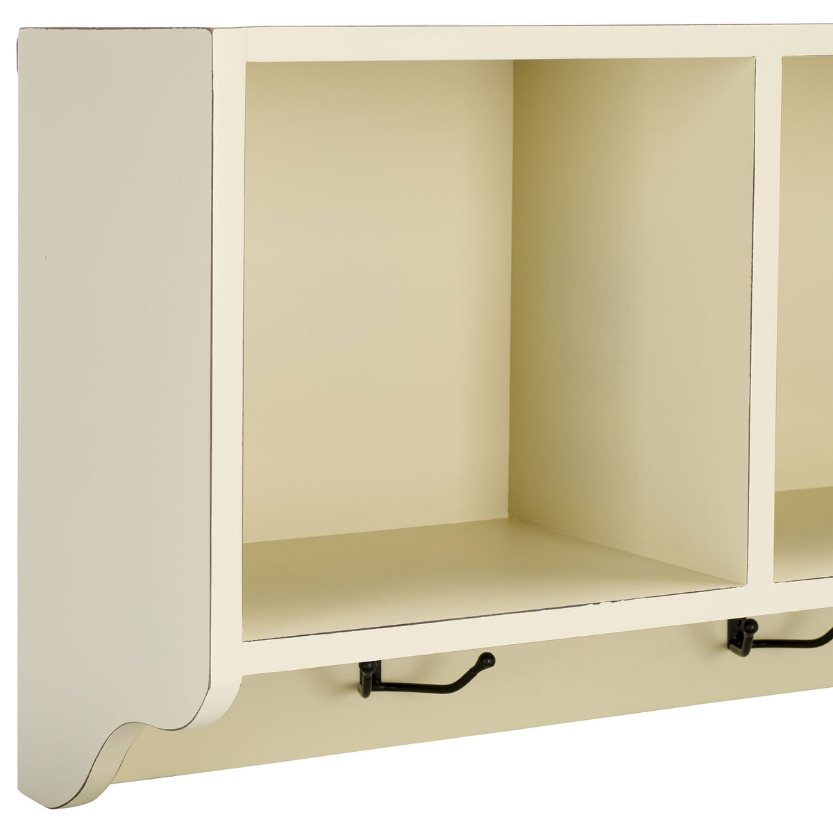 Spacious white cubby offers open storage above a black metal hook and sculpted lower edge