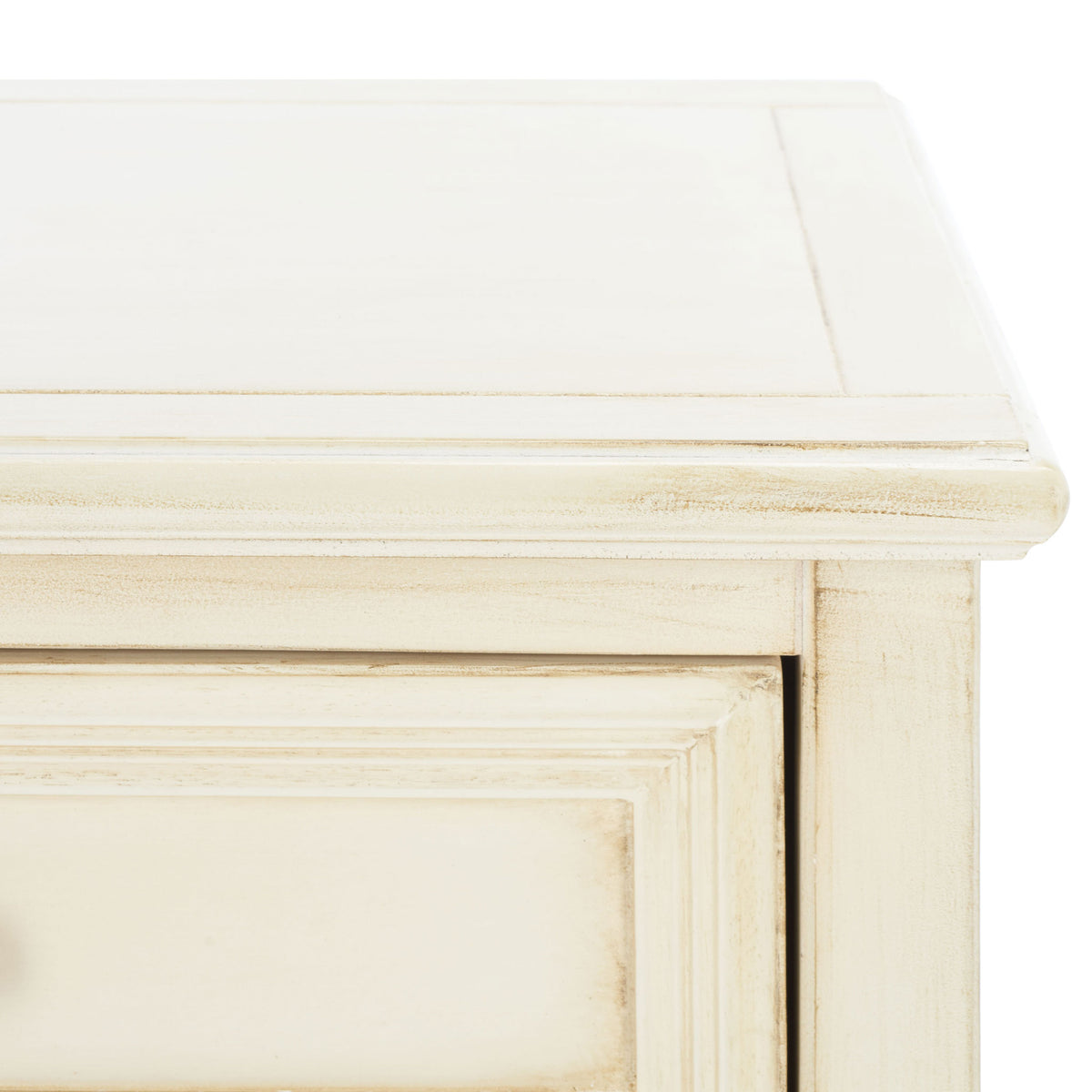 Gently worn cream finish accents the molded tabletop edge and layered panel trim || AMH6627D || detail_studio