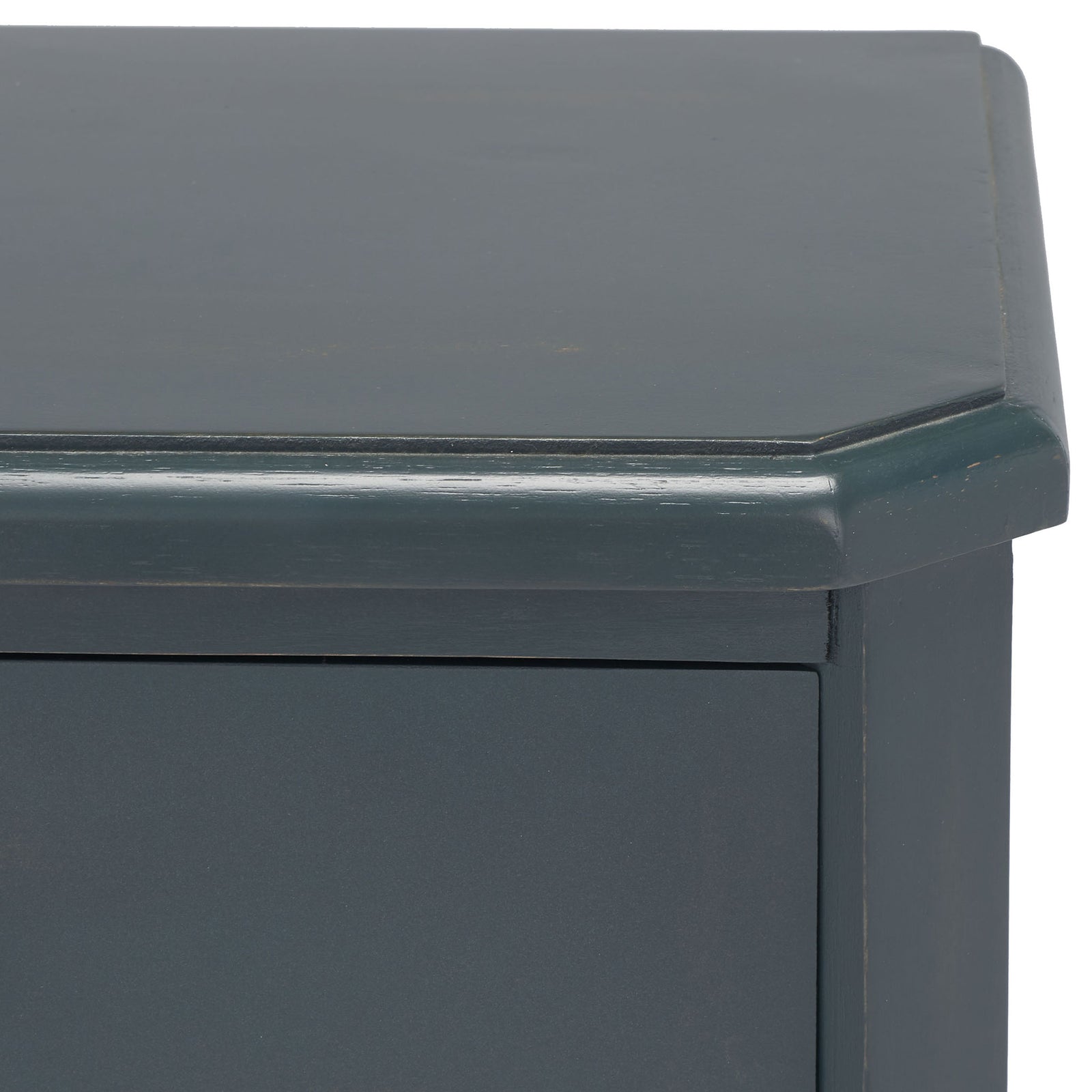 The dark teal tabletop has a gently beveled corner and a subtly worn finish. || AMH6629B || detail_studio