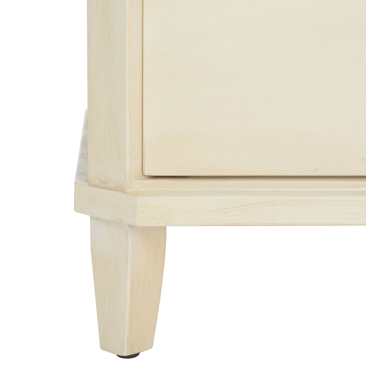 A pale, tapered wood foot gives the barley-finished nightstand an elegant lift. || AMH6629D || leg_studio