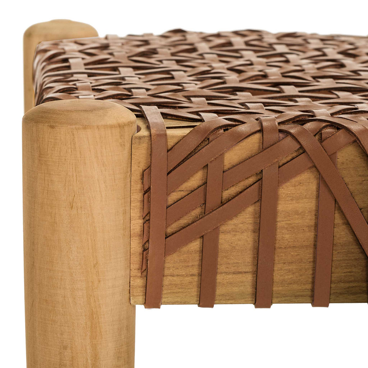 Honey-brown leather strips cross over the natural teak seat frame in an intricate weave.