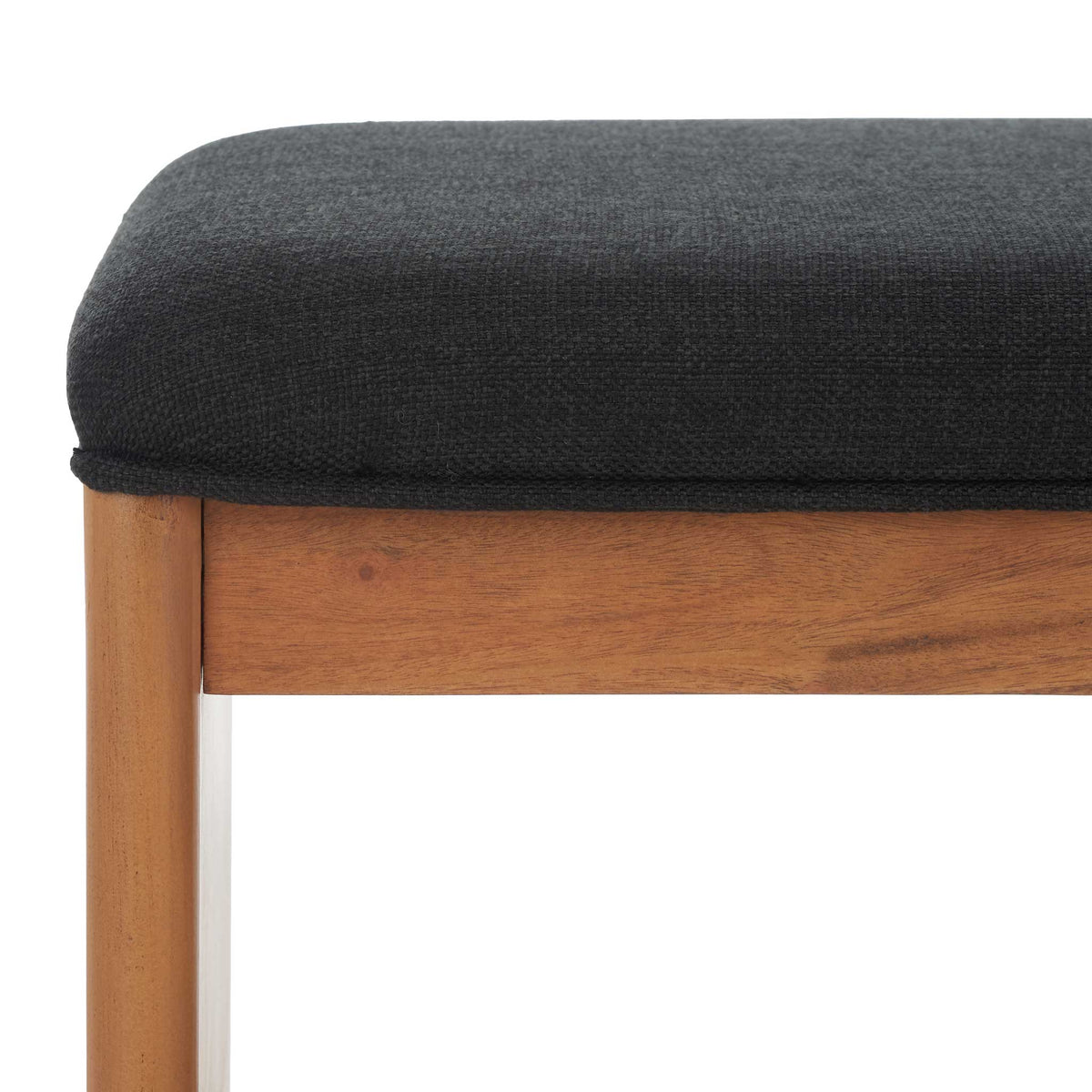 Textured black upholstery pairs with smooth natural wood for a refined, modern finish || BCH5001A || detail_studio