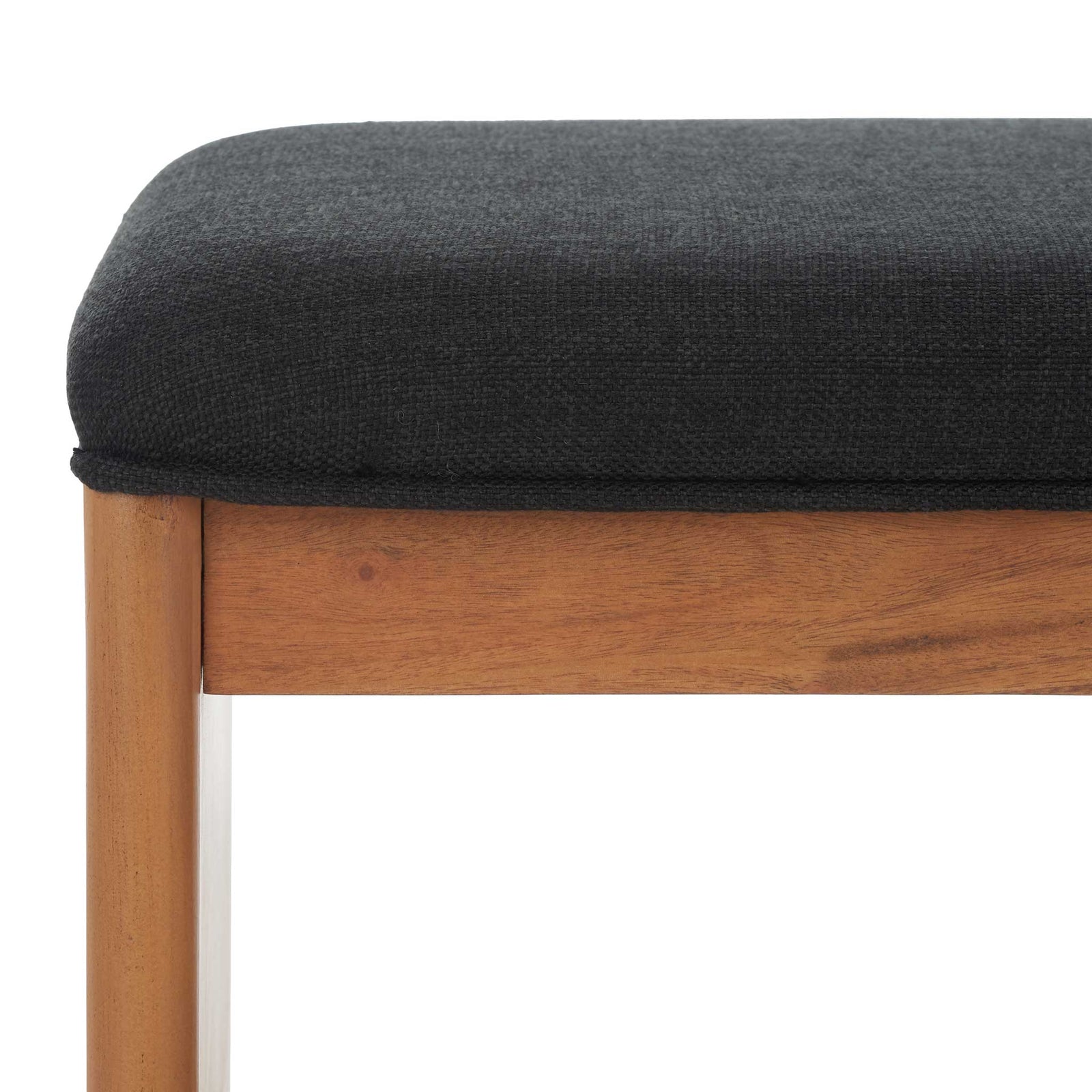 Textured black upholstery pairs with smooth natural wood for a refined, modern finish || BCH5001A || detail_studio