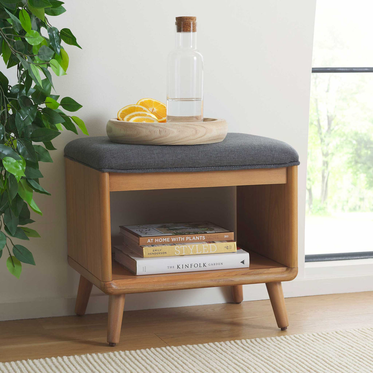Versatile bench doubles as seating and storage to tidy up modern living spaces. || BCH5001C || front_angle_room