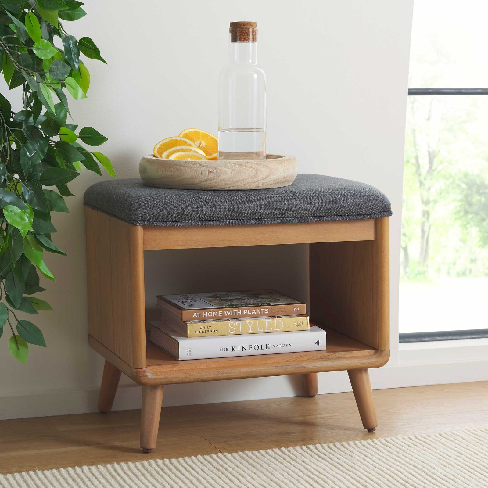 Versatile bench doubles as seating and storage to tidy up modern living spaces. || BCH5001C || front_angle_room