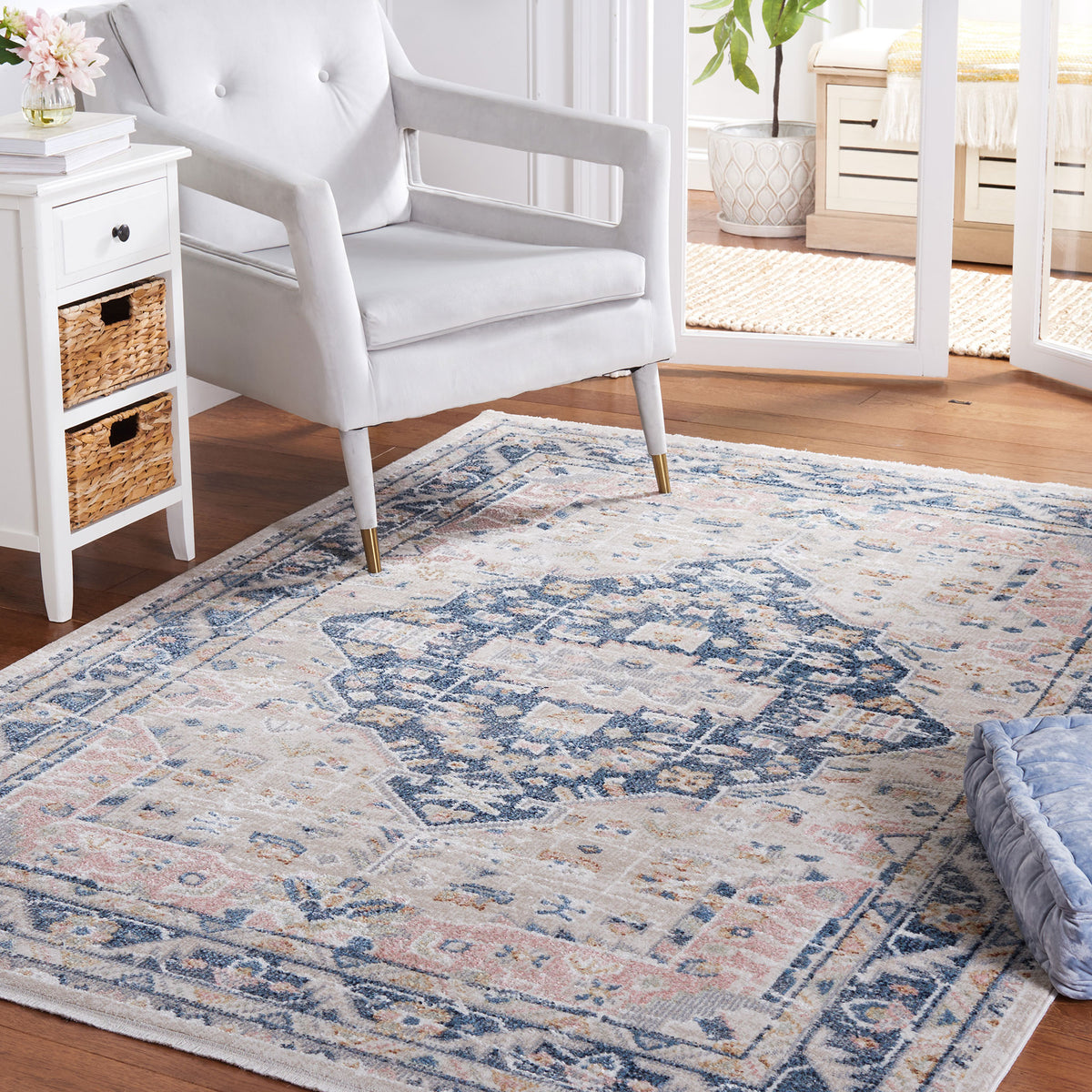 Vintage-inspired rug anchors the space with a central medallion and versatile beige and navy palette. || BLR200B-5 || front_angle_room