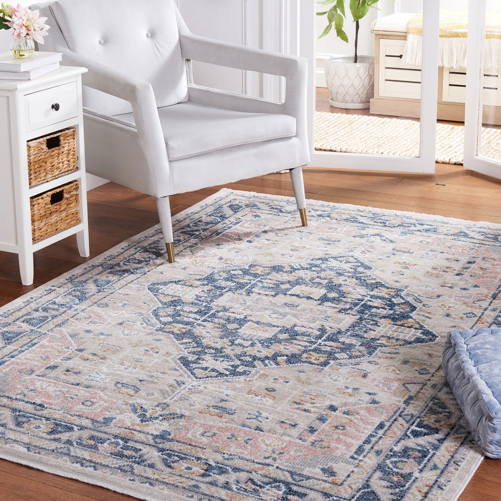 Vintage-inspired rug anchors the space with a central medallion and versatile beige and navy palette. || BLR200B-5 || front_angle_room