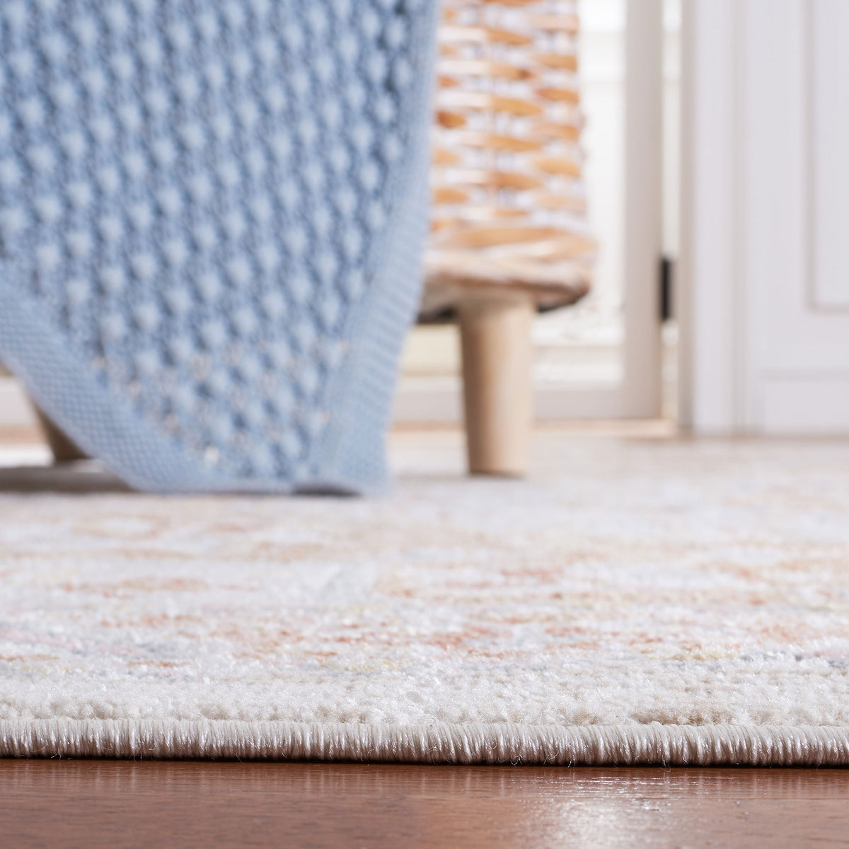 Low-profile edge sits neatly against hardwood floors for easy placement under furniture. || BLR202B-5 || detail_room