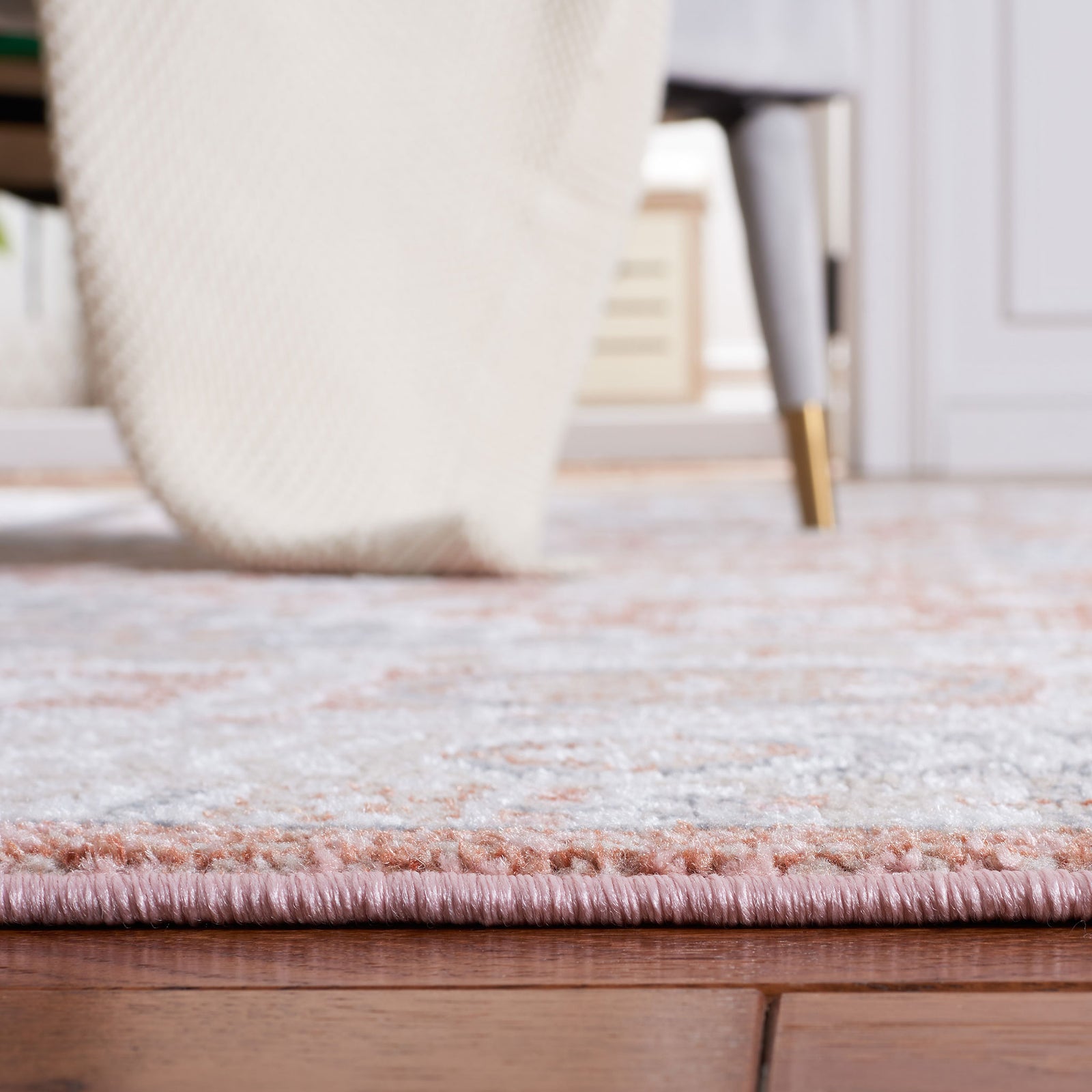 Low-profile pile with a soft sheen blends rose and gray tones for a cozy, polished look || BLR206U-5 || detail_room