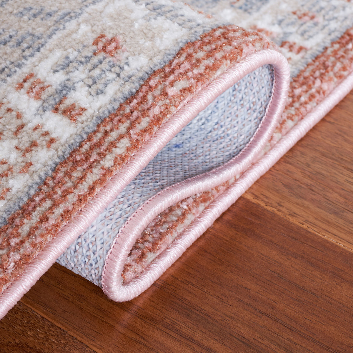 Non-slip backing and sturdy pink serged edge for reliable grip and durability || BLR206U-5 || backing_room
