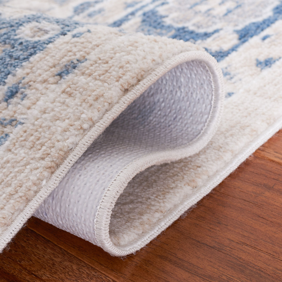 Folded edge reveals durable backing and flexible, easy-care construction || BLR208B-5 || backing_room