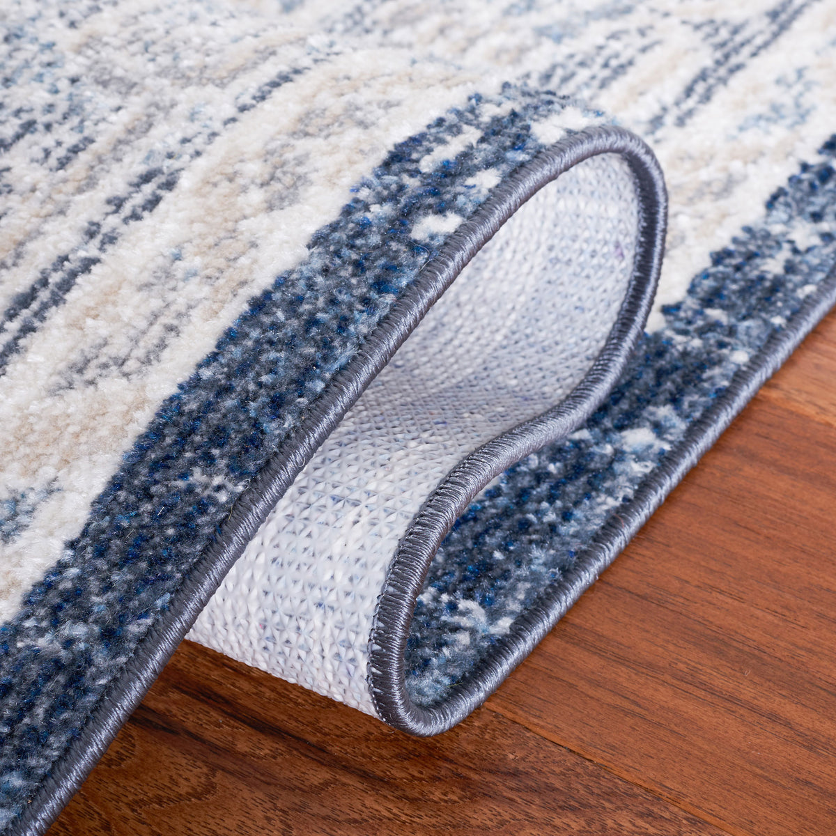Durable patterned backing with serged edge and flexible, easy-to-lift design || BLR210B-5 || backing_room