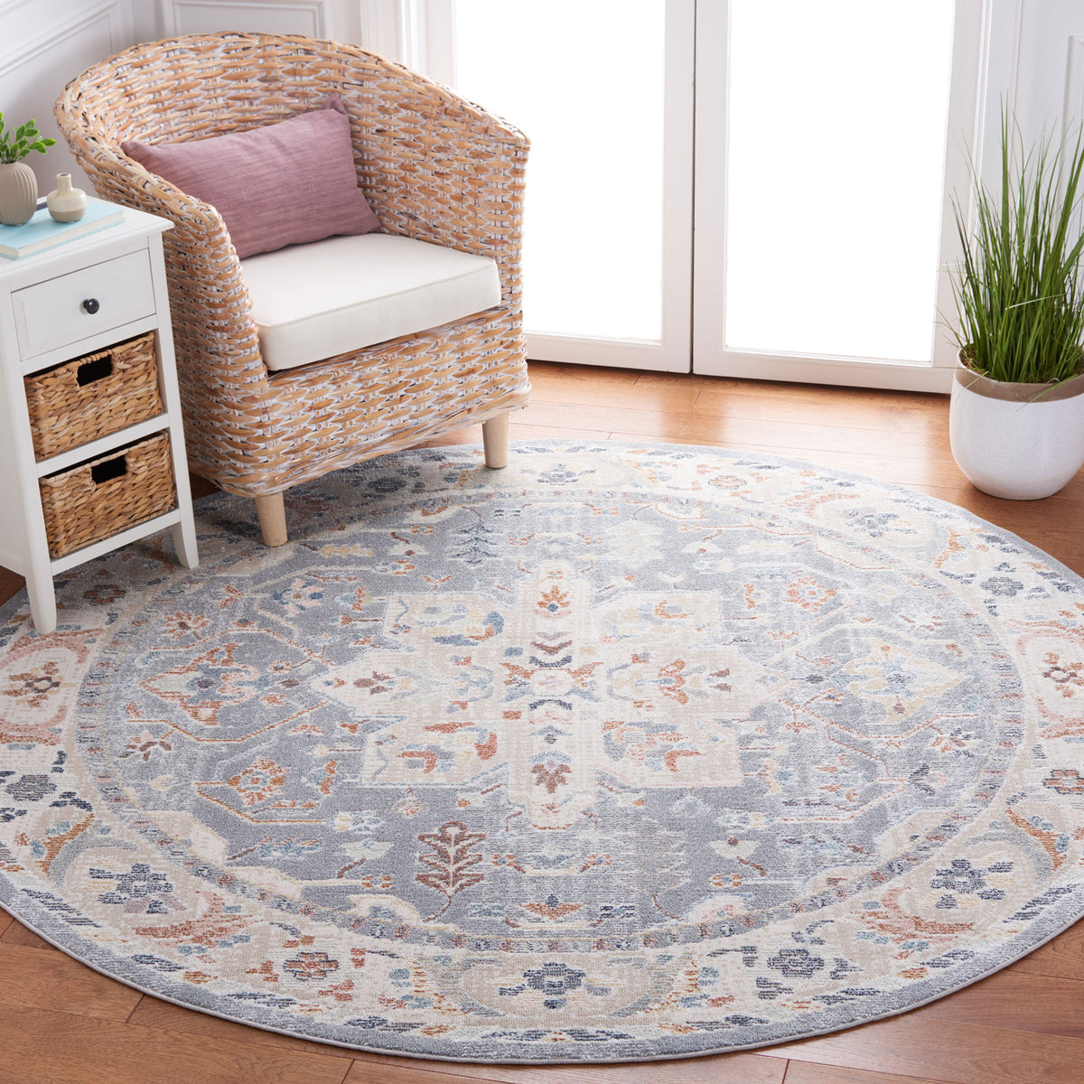 Vintage-inspired round rug in calming beige and blue anchors the room with a soft, cushioned feel. || BLR212B-7R || top_room