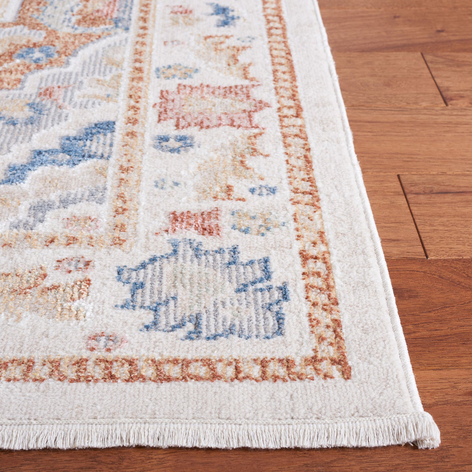 Vintage medallion rug in beige and rust with blue accents and a low, soft pile || BLR214B-5 || top_studio