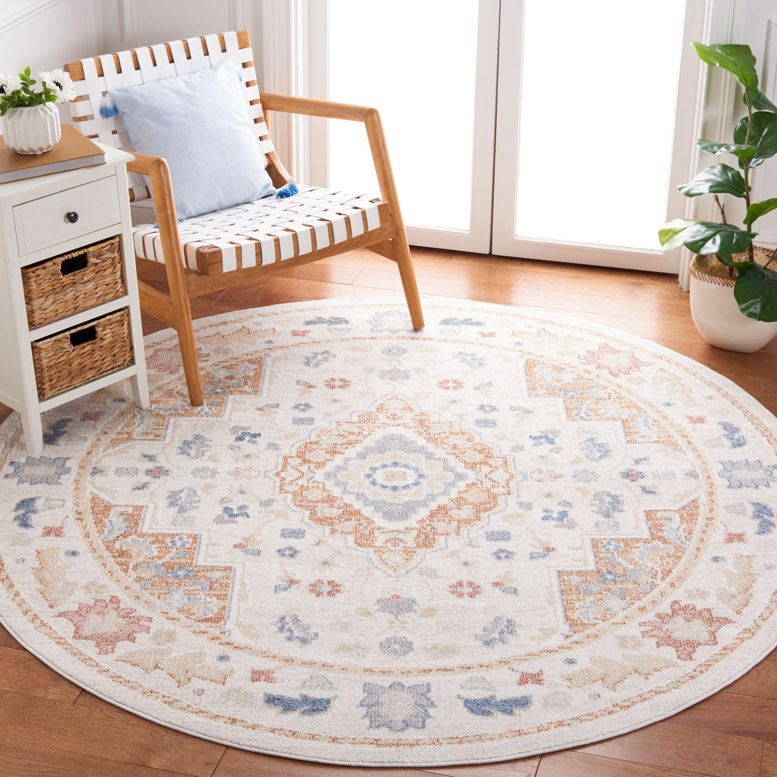 Round beige and rust rug adds vintage charm with a medallion center and gently faded tones || BLR214B-7R || top_room