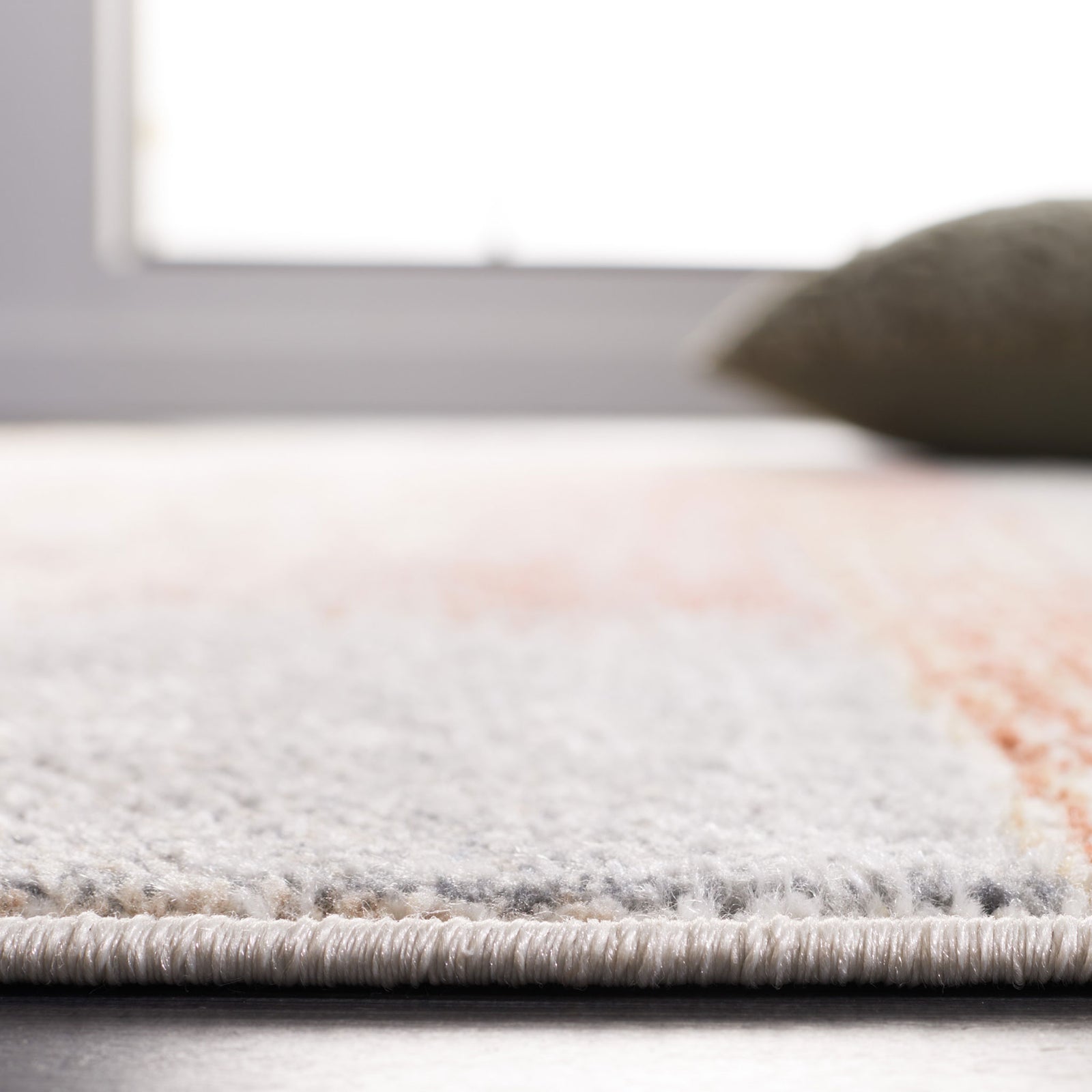 Low-profile pile and sturdy edge sit flat for easy placement under chairs and tables || BLR216B-5 || detail_room