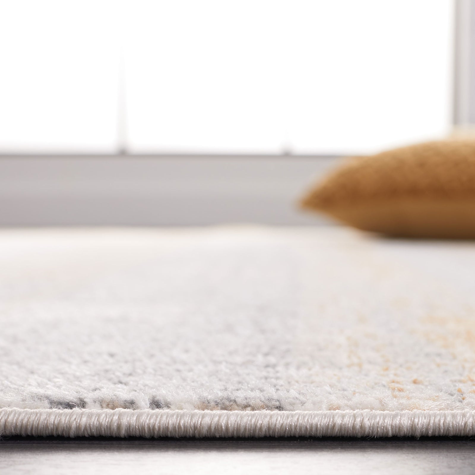 Low-profile pile offers a smooth, cushioned feel underfoot. || BLR216F-5 || detail_room