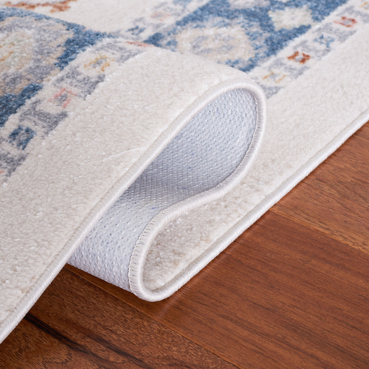 Folded corner reveals textured backing and neatly finished edges || BLR218B-5 || backing_room