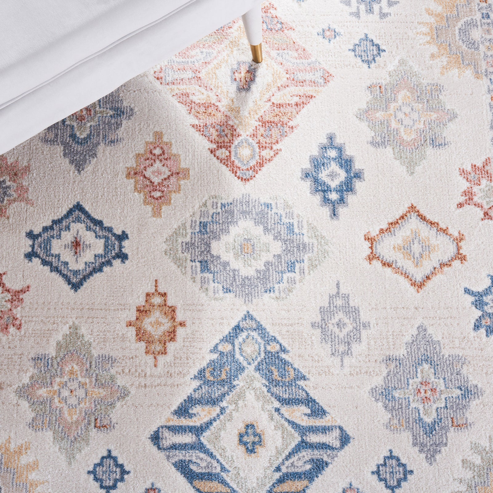 Colorful medallion motifs pop against a creamy ground for a bright, boho look || BLR218B-5 || detail_room
