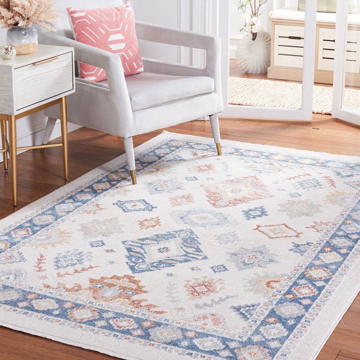 Beige and blue rug warms the room with boho medallions and a softly textured surface || BLR218B-5 || front_angle_room