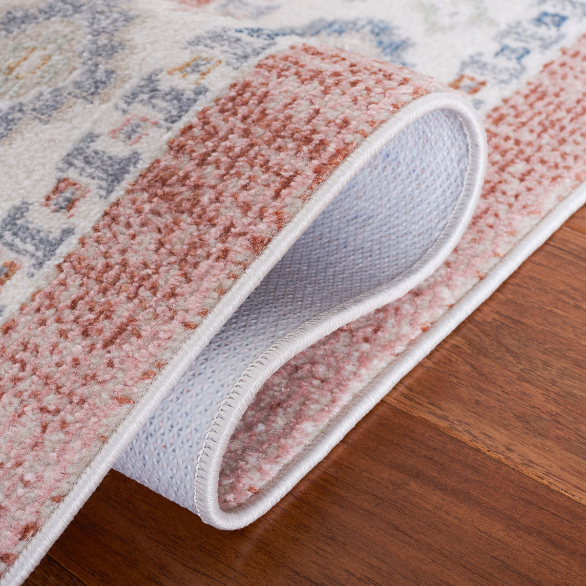Folded corner reveals textured backing and tightly bound edges || BLR218U-5 || backing_room