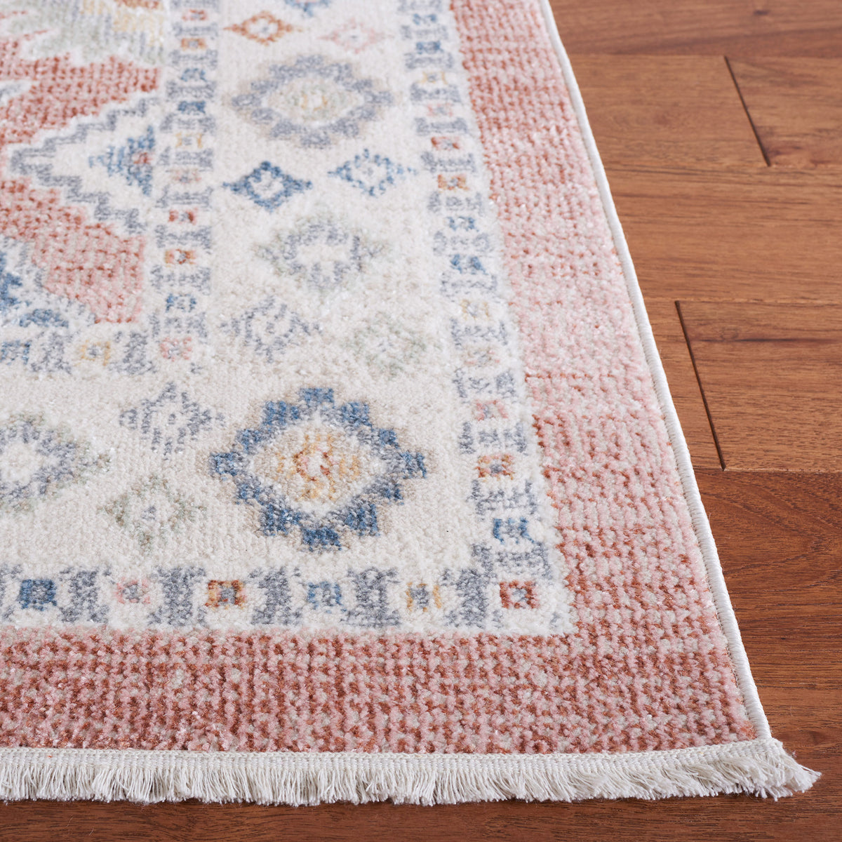 Ivory border with geometric motifs and short fringe detailing || BLR218U-5 || corner_room