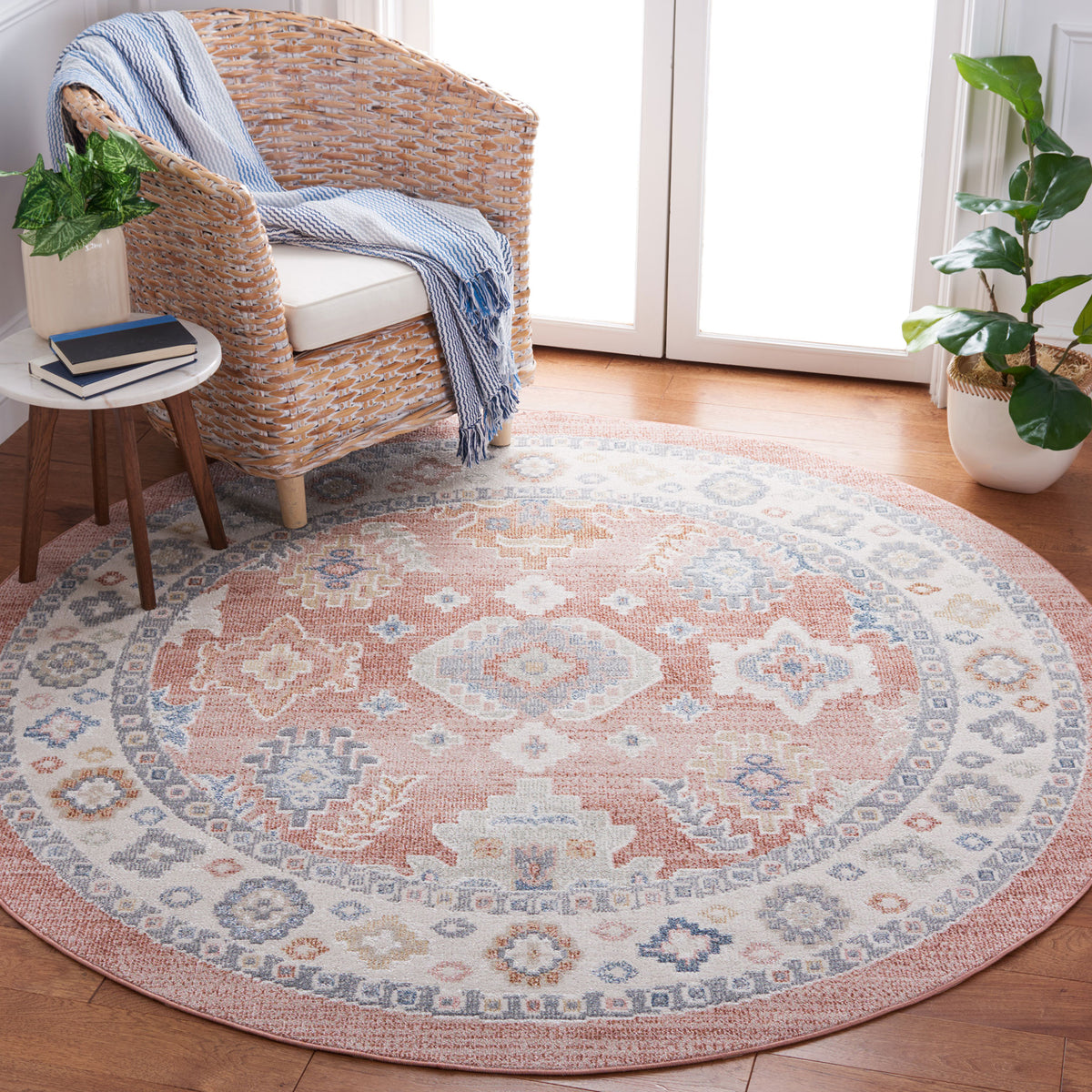 Vintage-inspired round rug in rose and blue brightens the room with soft, washable comfort || BLR218U-7R || top_room