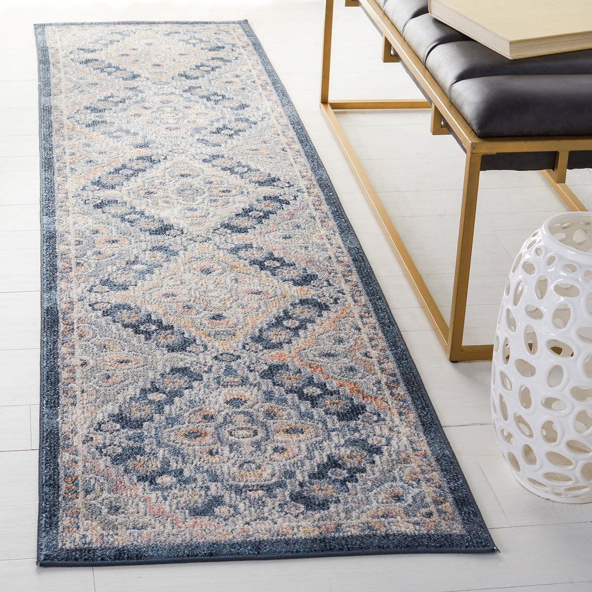 Vintage-style gray and navy runner brings layered medallions and a refined border to modern spaces || BLR220F-28 || front_angle_room
