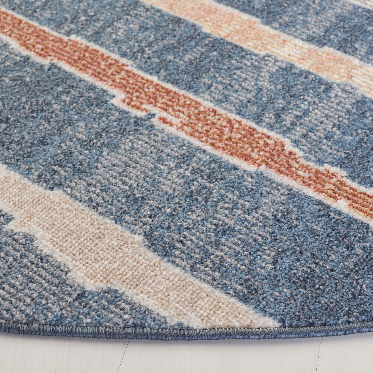 Plush, high-low texture highlights abstract stripes and a neatly finished edge in blue and blush || BLR222M-7R || detail_room