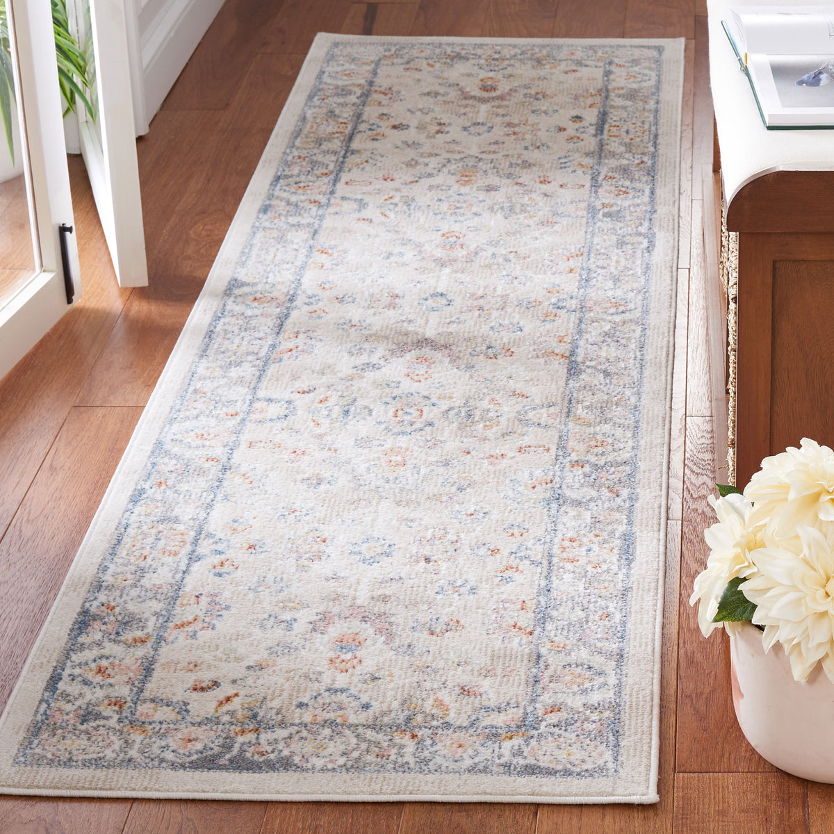 Classic floral runner in beige and gray with a gently distressed look and subtle blue accents || BLR224B-28 || top_angle_room