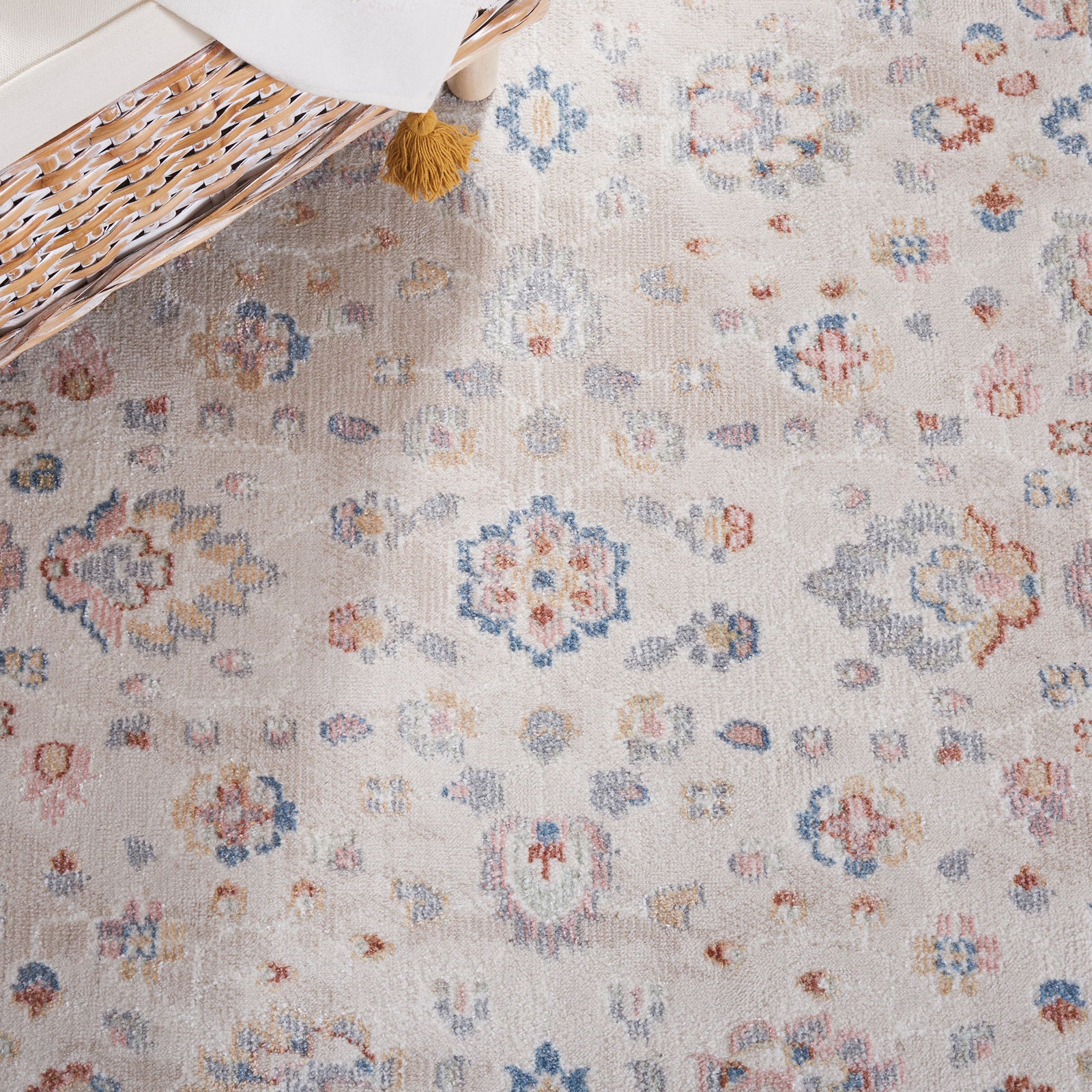 Allover medallion pattern in muted pastels on a warm beige ground for a timeworn look. || BLR224B-5 || detail_room