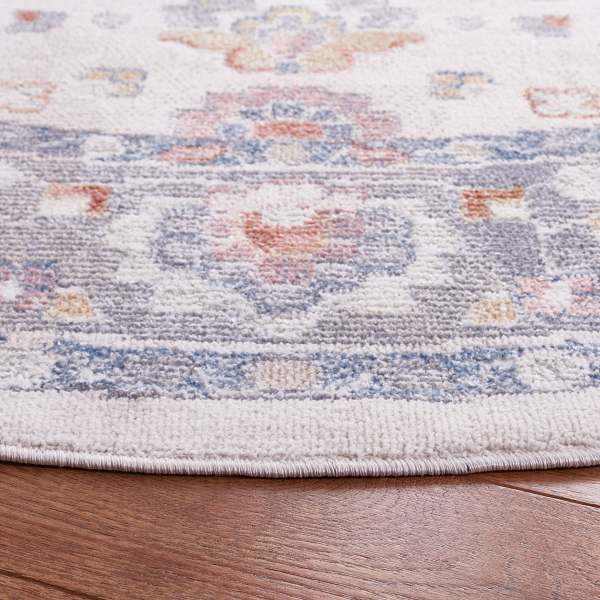 Textured pile and finished edge in blended beige, gray, and blue tones || BLR224B-7R || detail_room