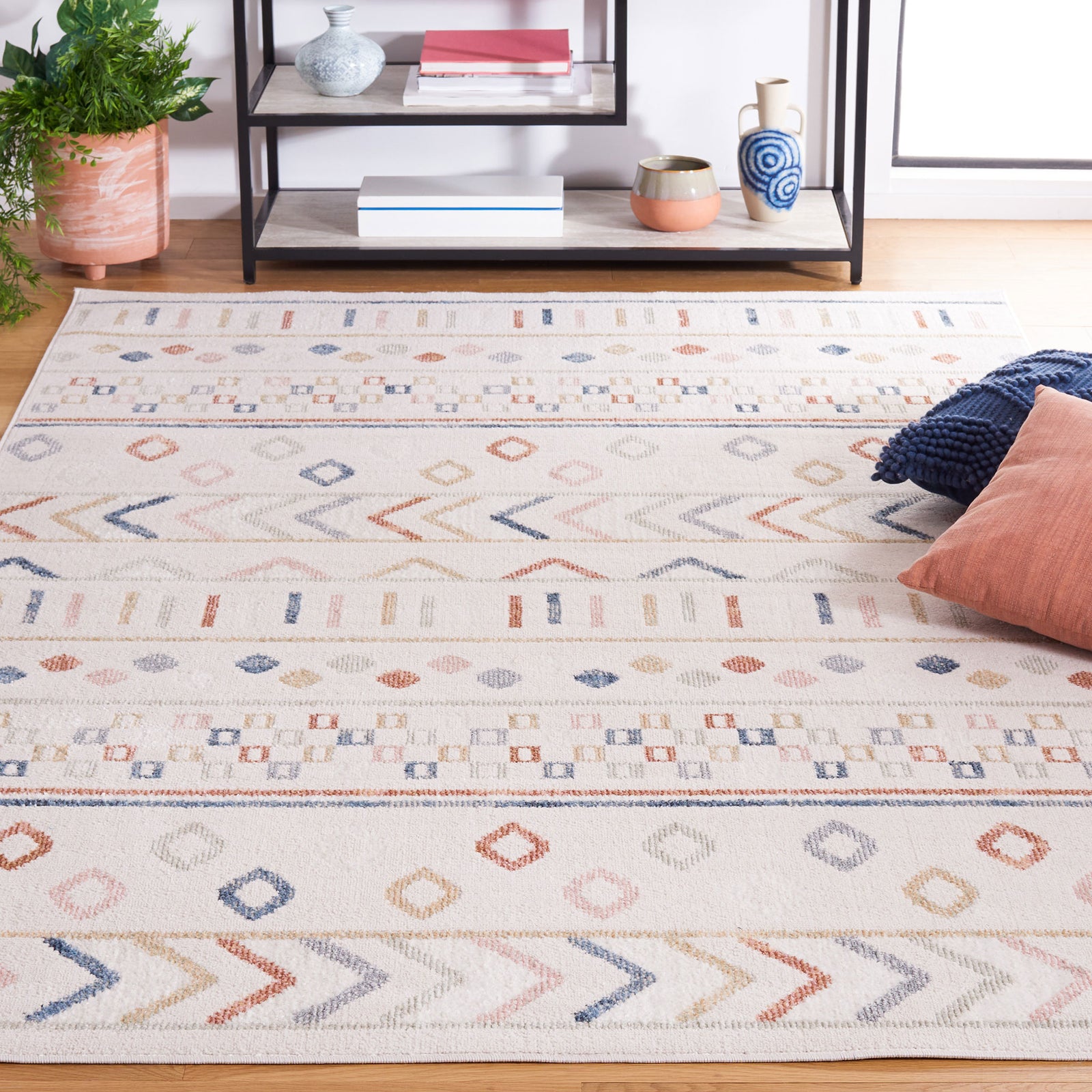Pastel diamond and chevron rug anchors the room with soft texture and airy, neutral tones || BLR226B-5 || top_room