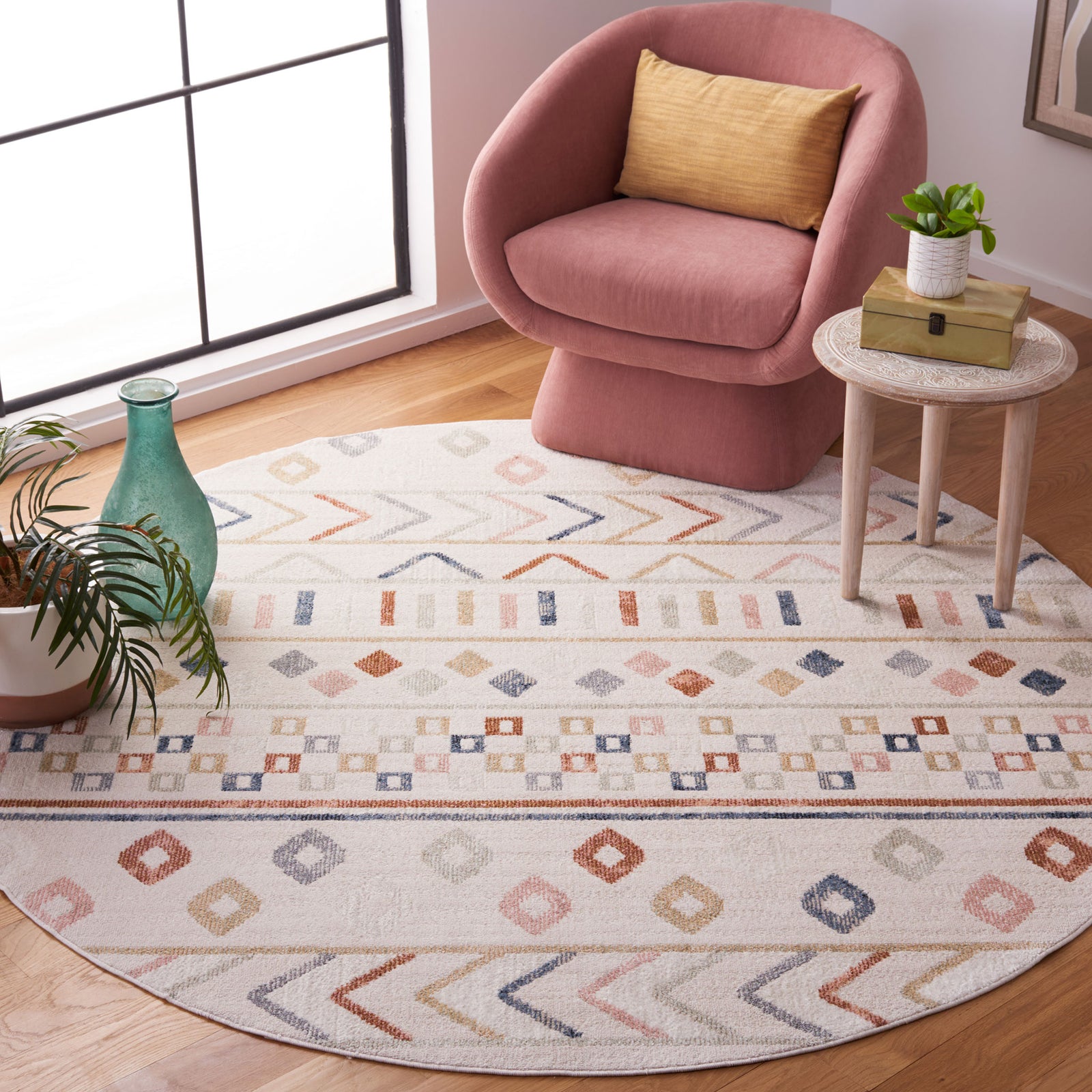 Beige round rug with colorful chevrons and diamonds that liven up modern spaces || BLR226B-7R || top_angle_room
