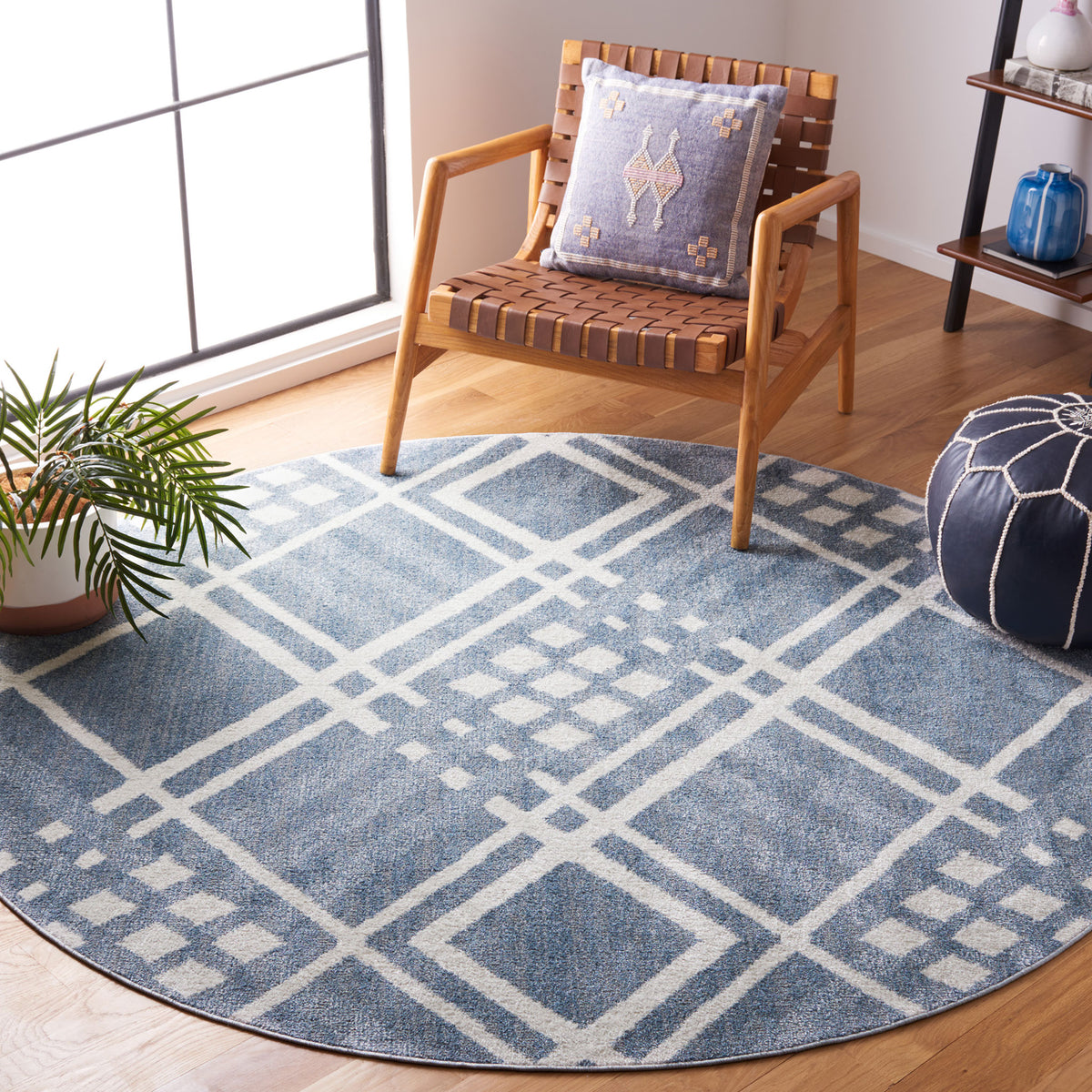 Round blue and ivory geometric rug adds soft texture and pattern to a bright, airy room. || BLR228M-7R || top_room