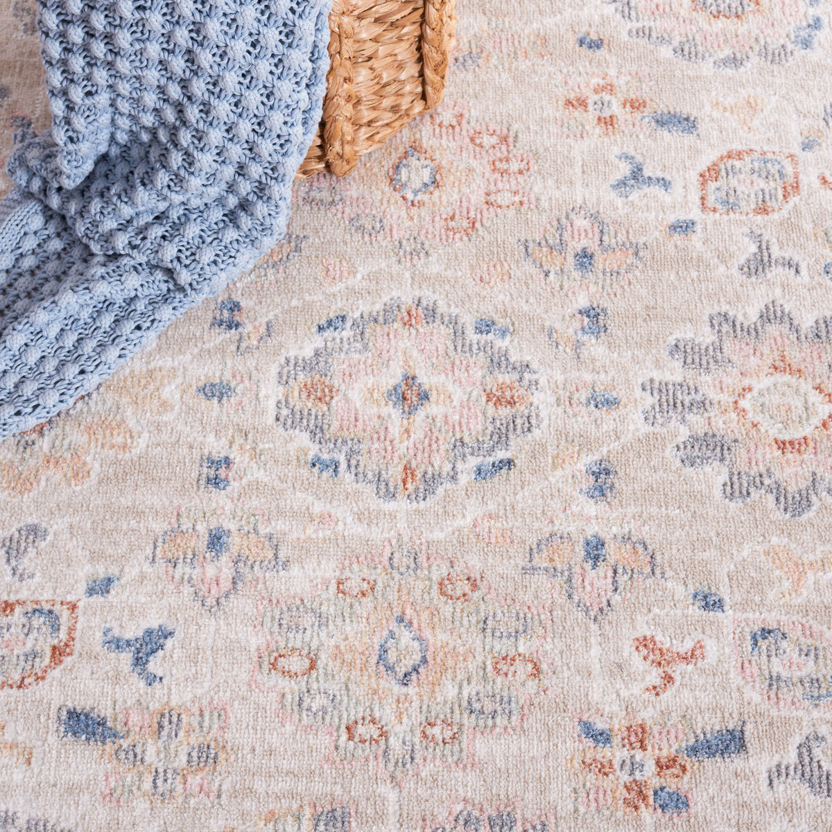 Subtle florals and painterly motifs blend beige, blue, and rust tones for an inviting, lived-in look. || BLR232B-5 || detail_room