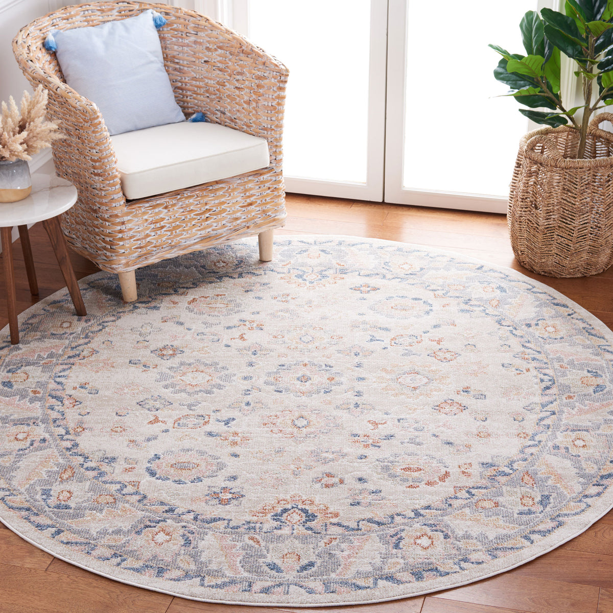 Vintage-inspired round rug in beige and gray with subtle blue accents, brightening decor with easygoing charm. || BLR232B-7R || top_angle_room