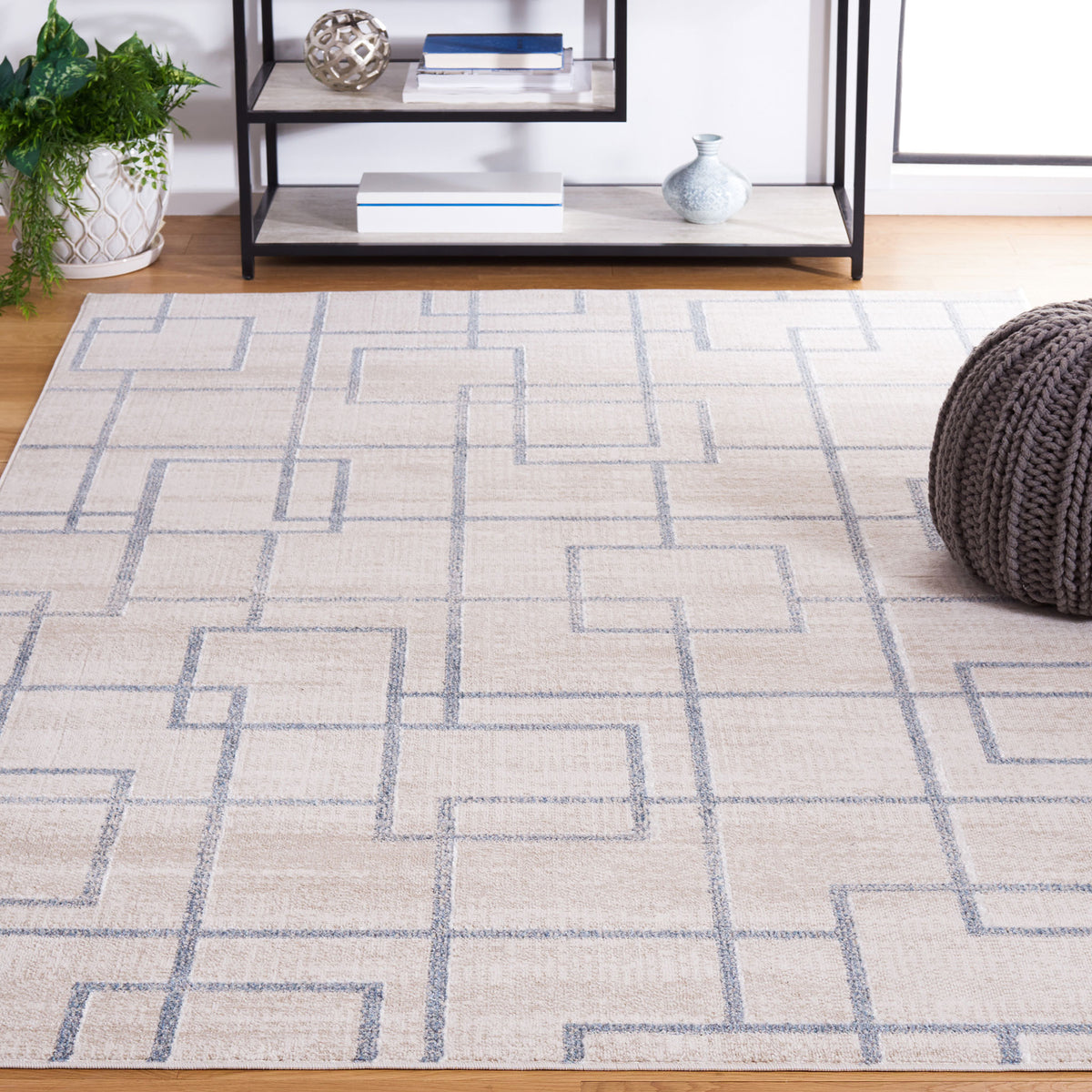 Beige and gray geometric area rug anchors a modern room with clean-lined pattern || BLR238B-5 || front_angle_room