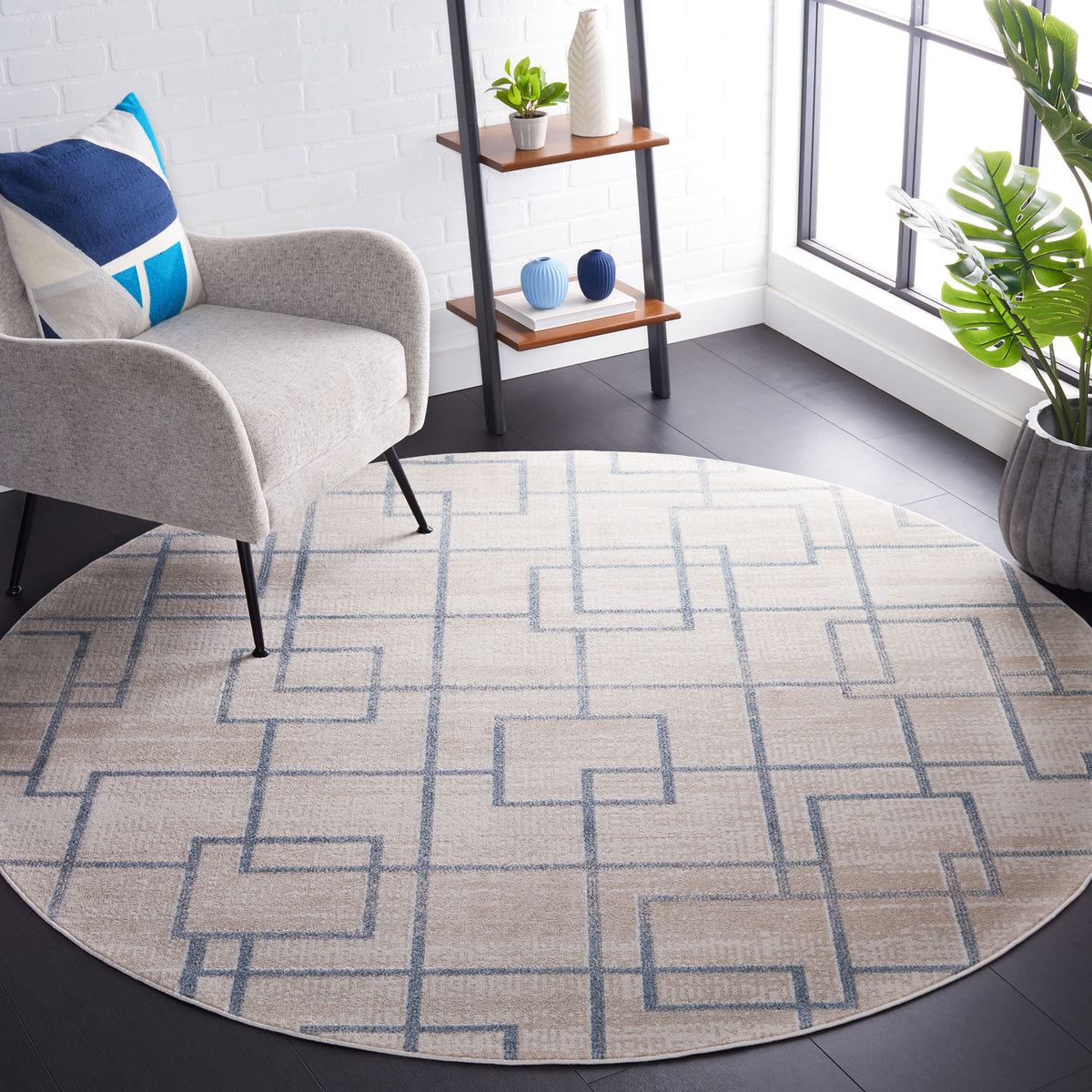 Round beige and gray geometric rug adds crisp pattern and soft texture to modern decor || BLR238B-7R || front_angle_room