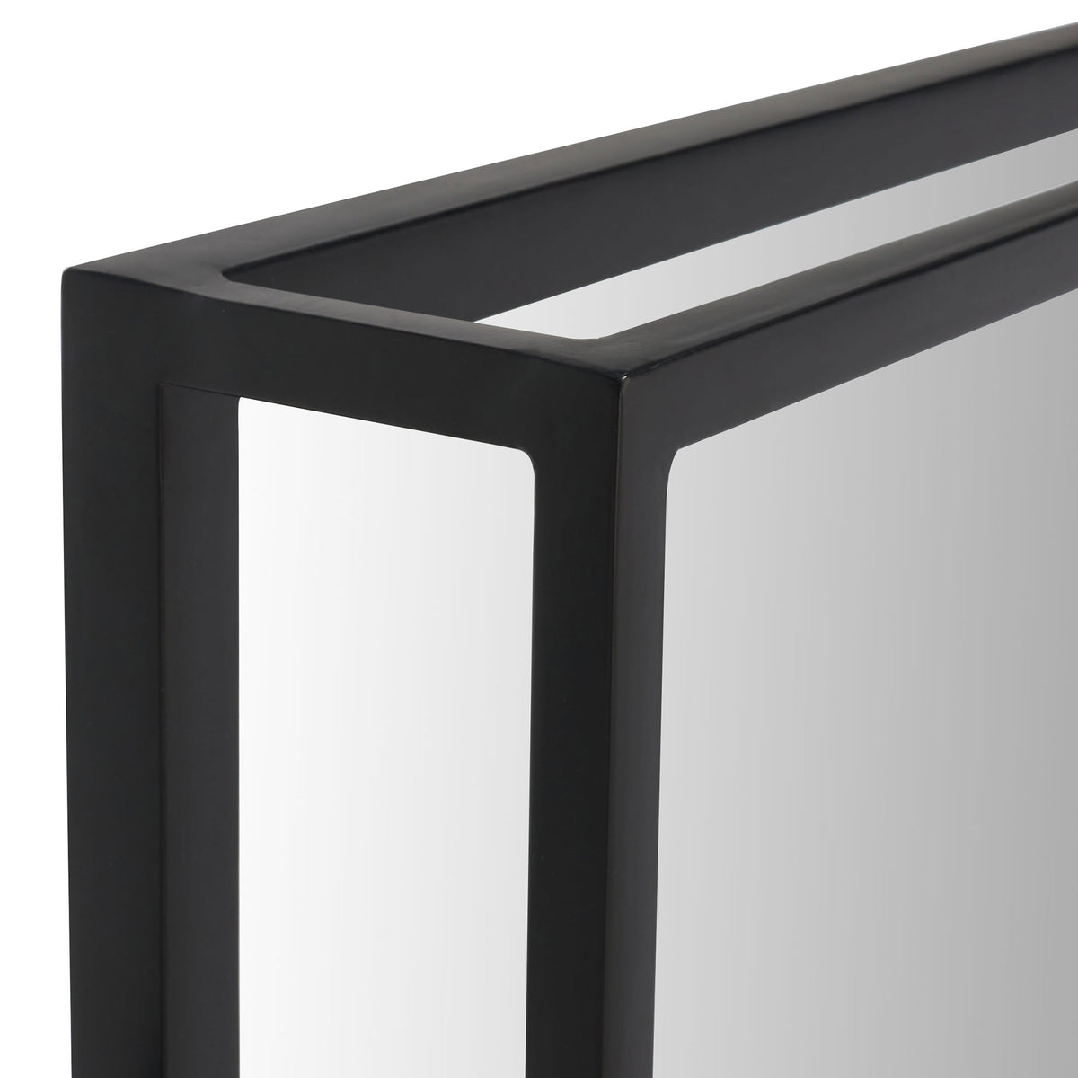 A sleek black metal frame adds sculptural depth around the mirror glass. || CMI1001A || detail_studio