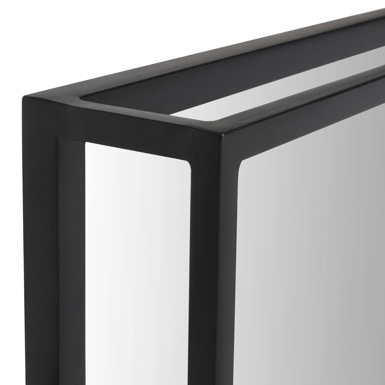 A sleek black metal frame adds sculptural depth around the mirror glass. || CMI1001A || detail_studio