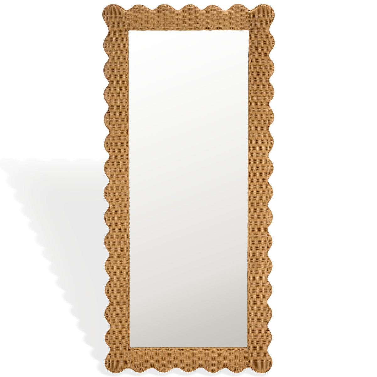 A tall rectangular mirror is bordered by woven natural rattan and playful scalloped edges. || CWK3021A || front_studio